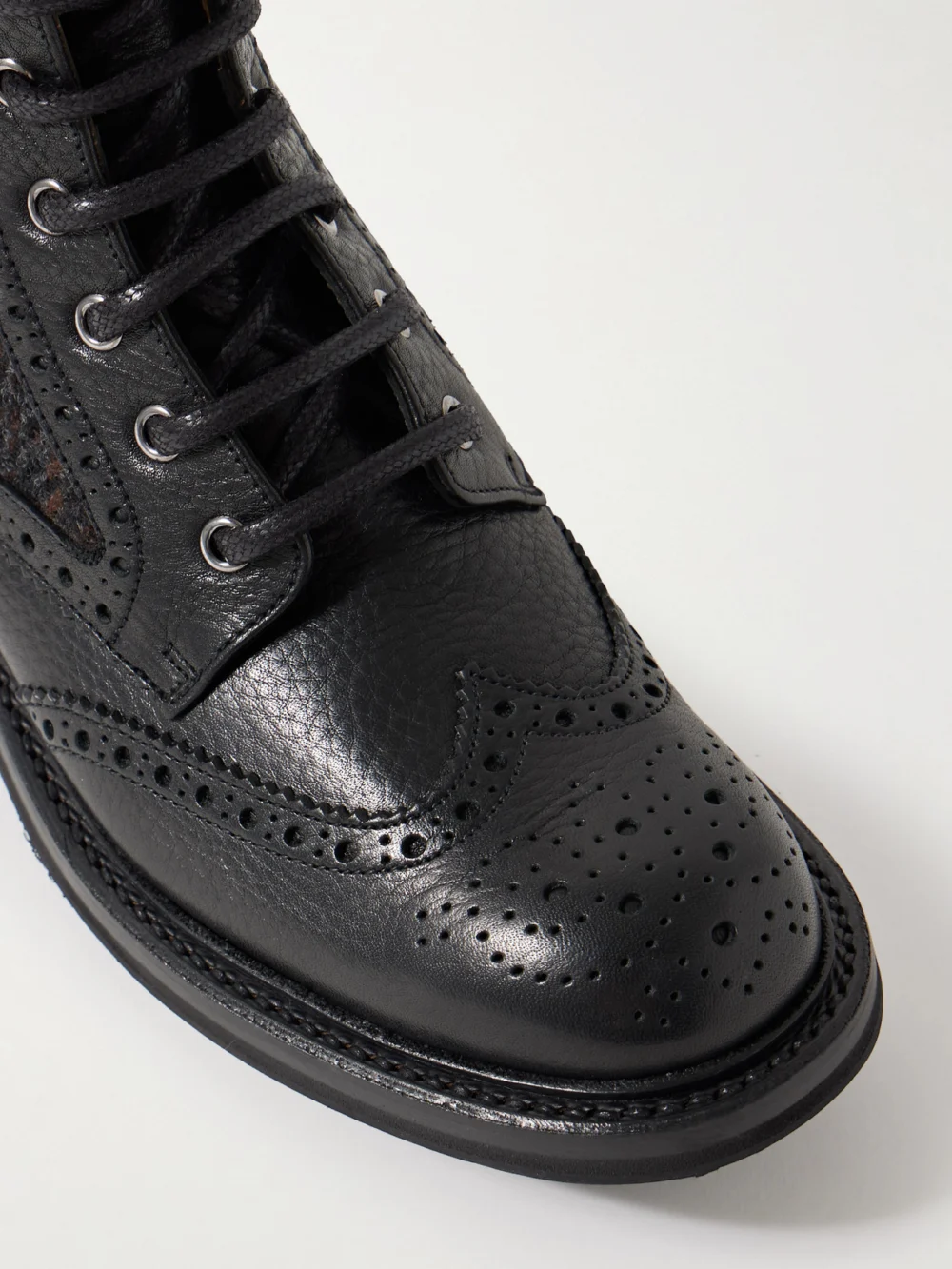 Close-up detail of the Church's Jacquard-paneled Leather Ankle Boots