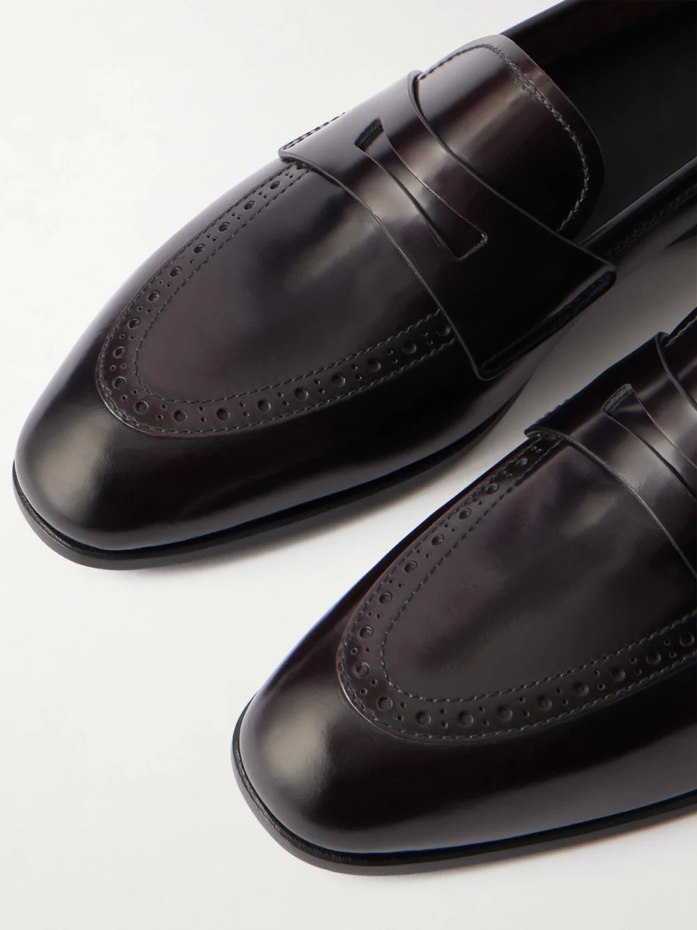 Close-up detail of the Church's Onyx Perforated Leather Loafers