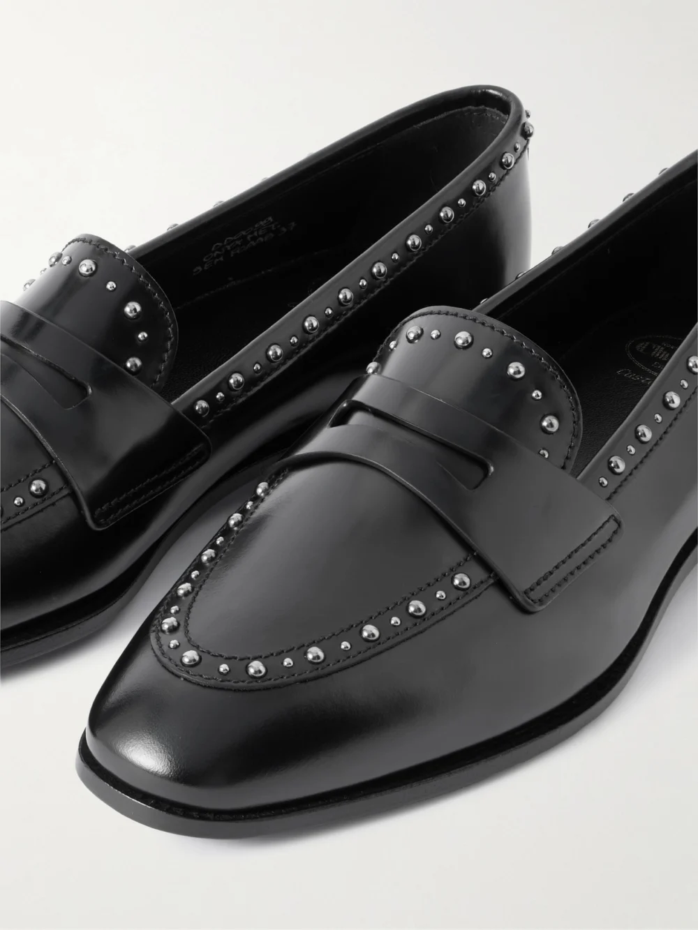 Close-up detail of the Church's Onyx Studded Leather Loafers