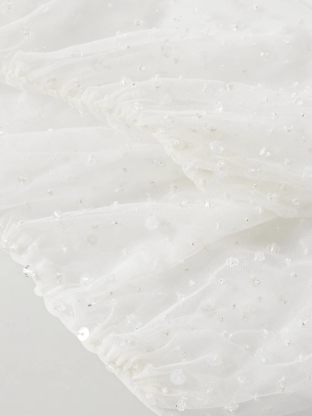 Close-up detail of the Clio Peppiatt Chantilly Embellished Ruched Tulle Gloves