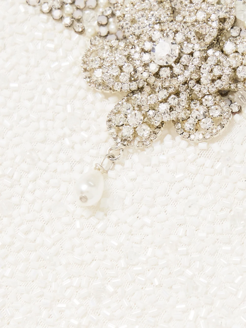 Close-up detail of the Clio Peppiatt Daisy Crystal and Bead-embellished Stretch-tulle Mini Dress