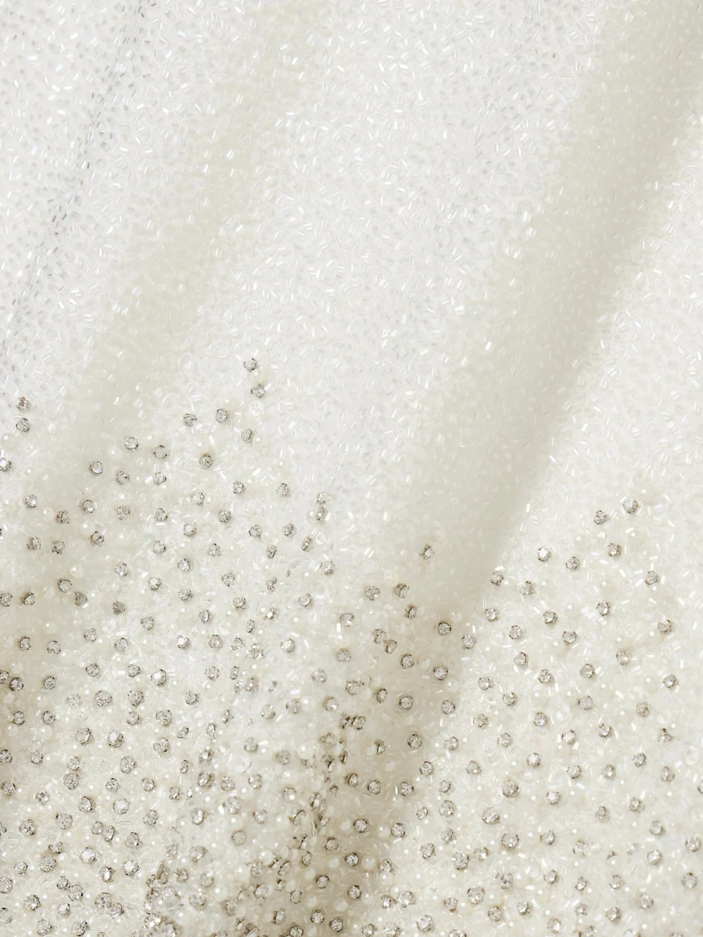 Close-up detail of the Clio Peppiatt Embellished Scalloped Stretch-tulle Mini Dress