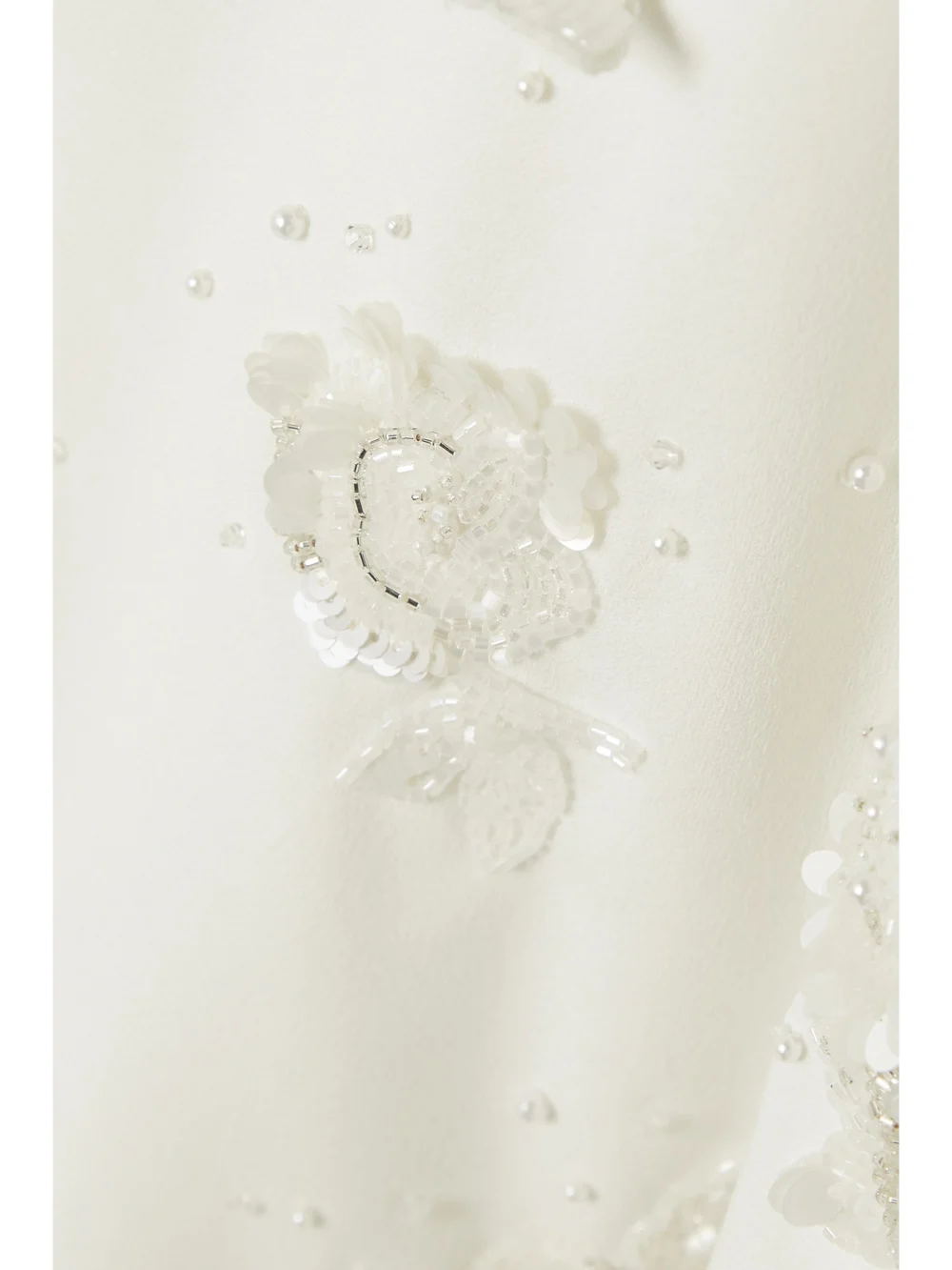 Close-up detail of the Clio Peppiatt Embellished Stretch-crepe Mini Dress