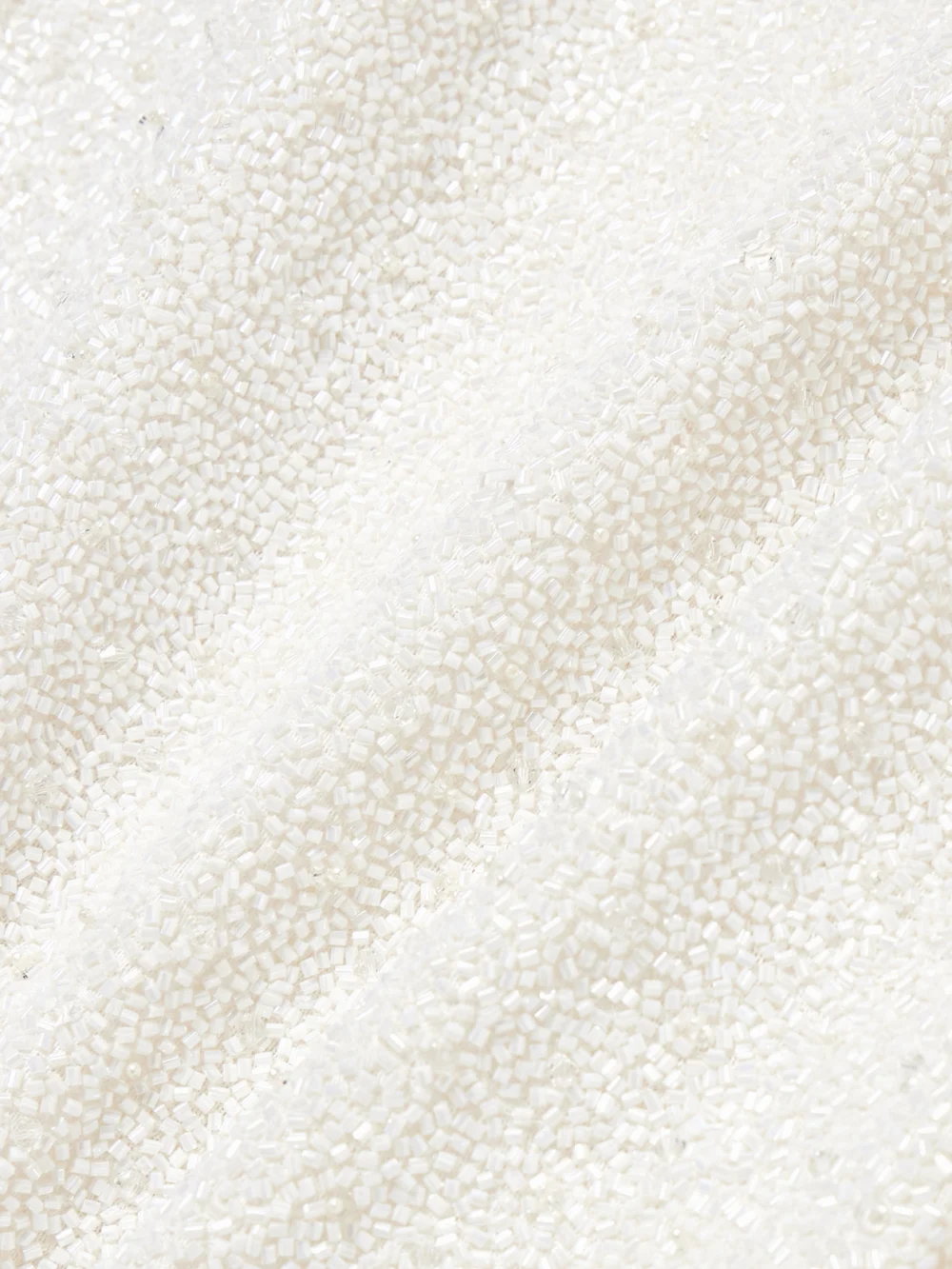 Close-up detail of the Clio Peppiatt Lille Bow-embellished Stretch-tulle Mini Dress