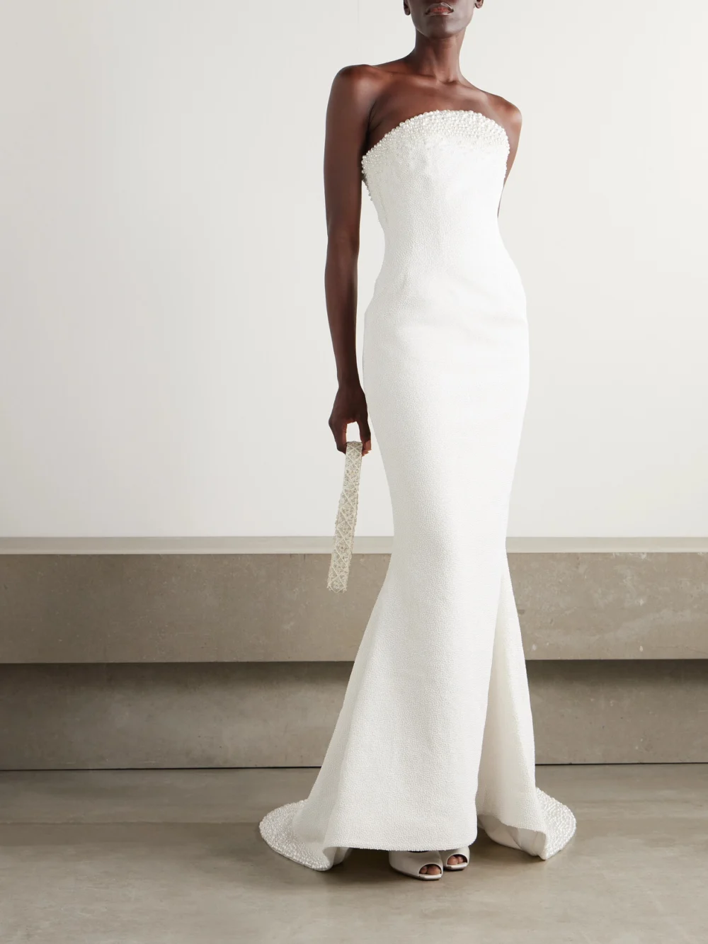 Clio Peppiatt Olympia Strapless Embellished Tulle Gown, worn by a model