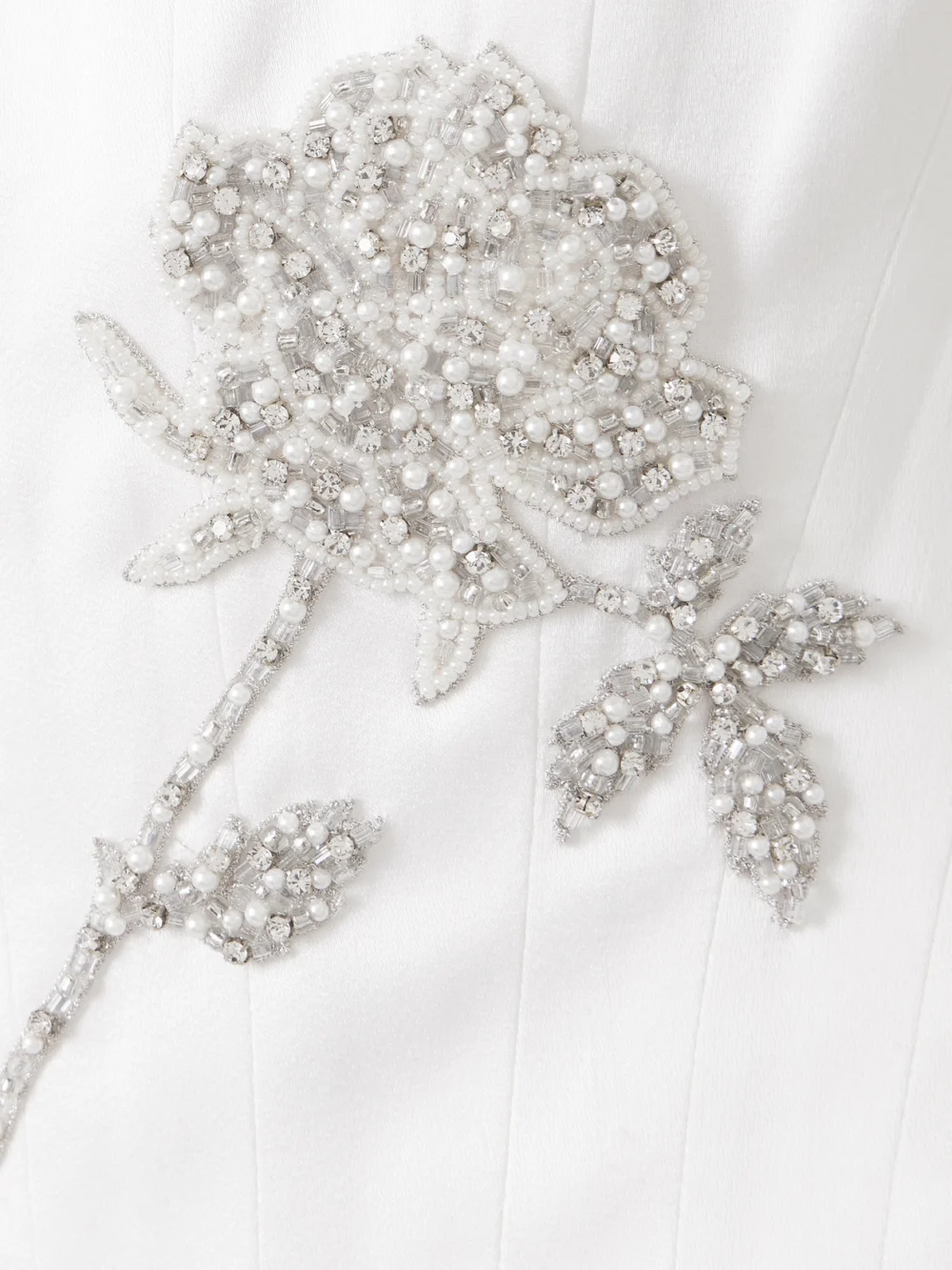 Close-up detail of the Clio Peppiatt Paloma Convertible Draped Embellished Satin Mini Dress