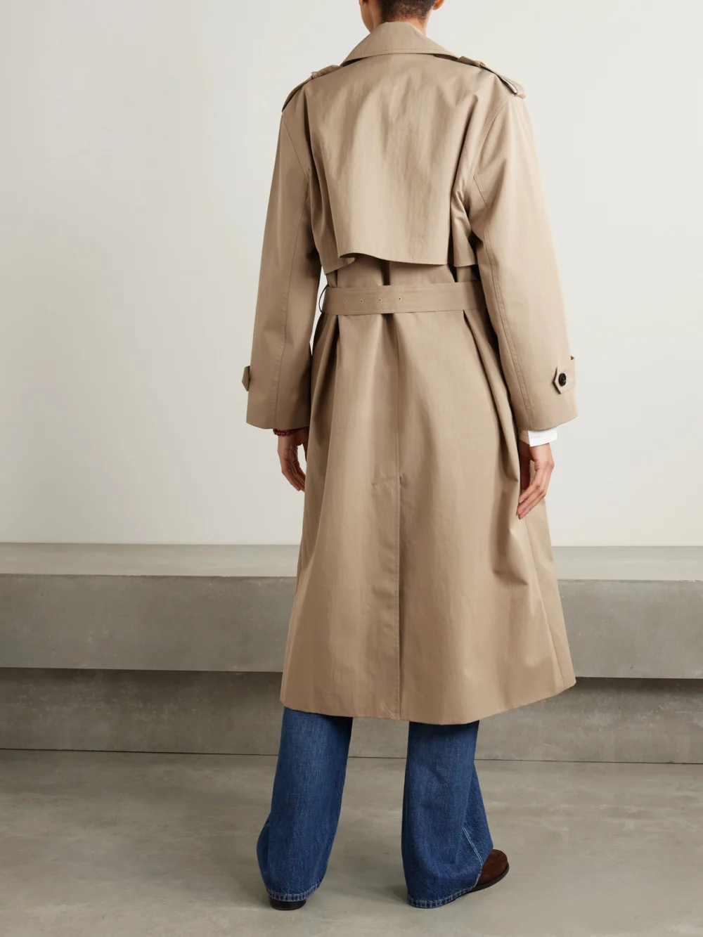 Back view of the Co Belted Double-breasted Cotton-blend Twill Trench Coat