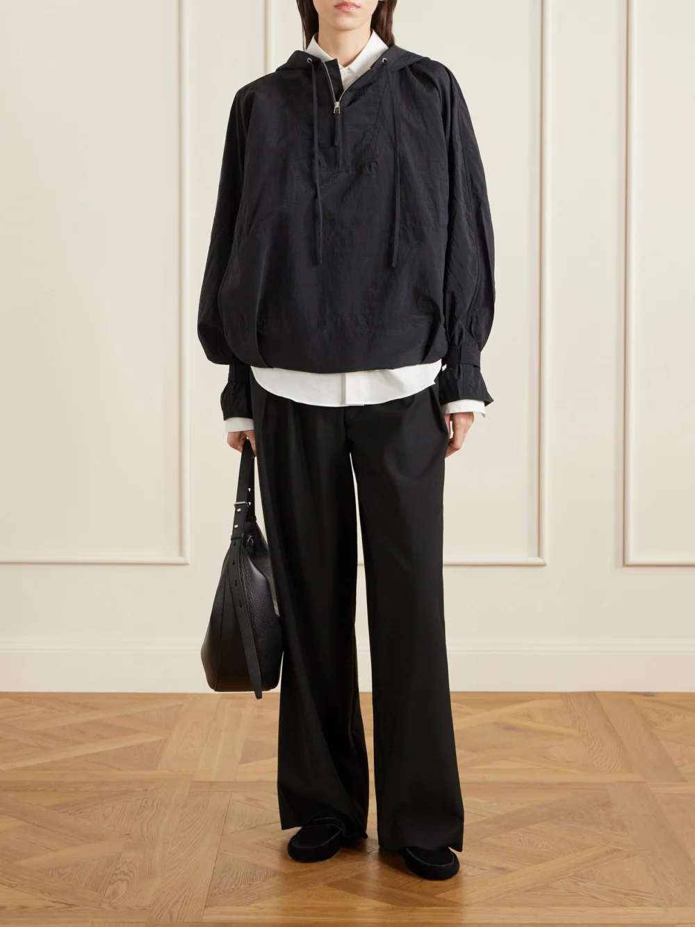 Co Embellished Recycled-shell Half-zip Jacket, worn by a model