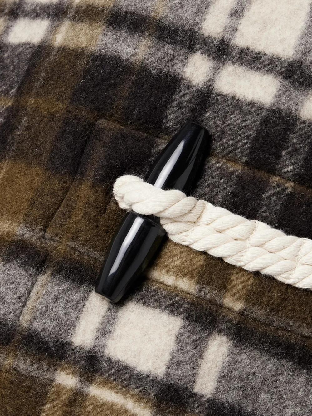 Close-up detail of the Co Hooded Checked Wool-felt Coat