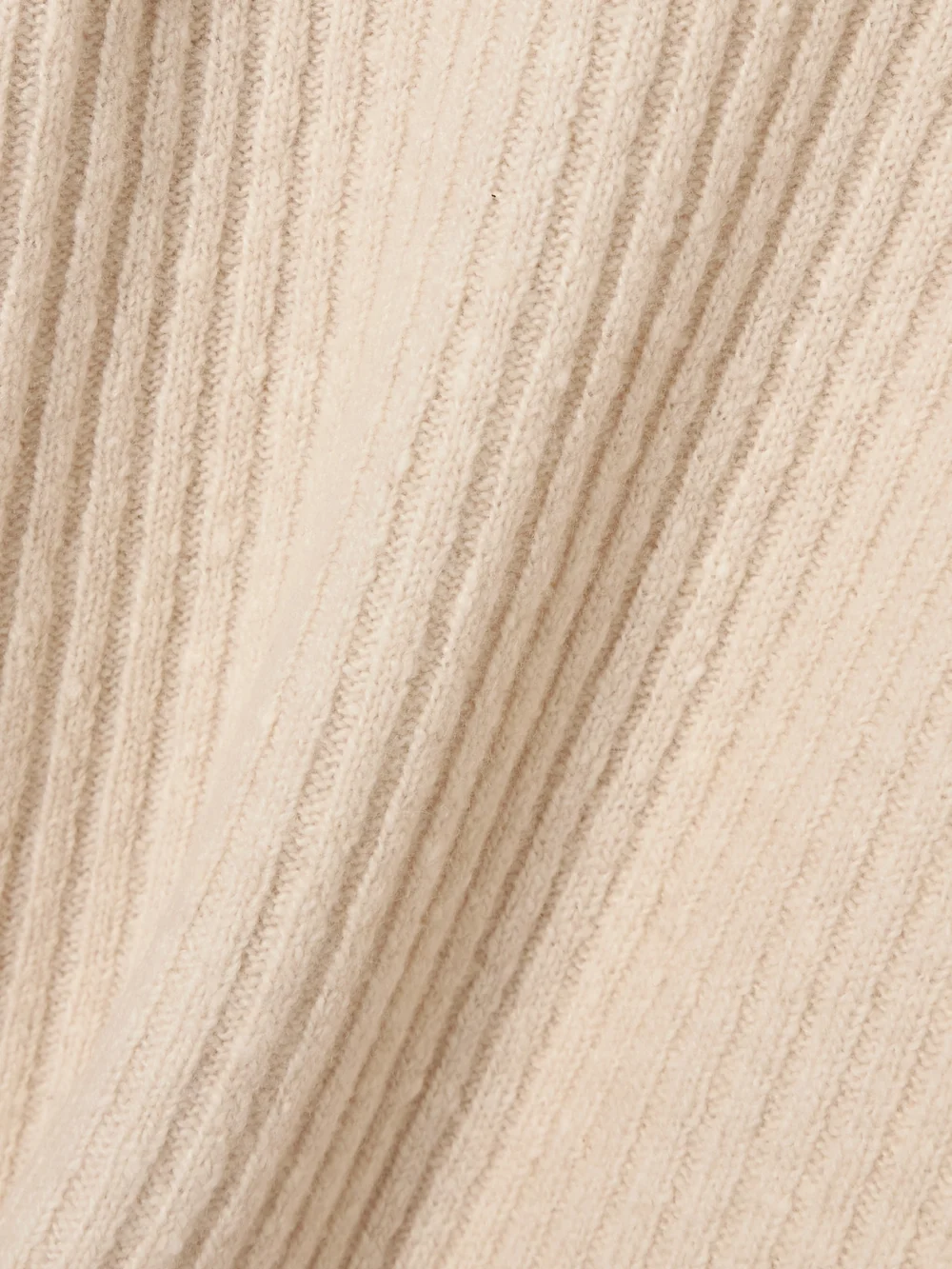 Close-up detail of the Co Ribbed Wool-blend Sweater