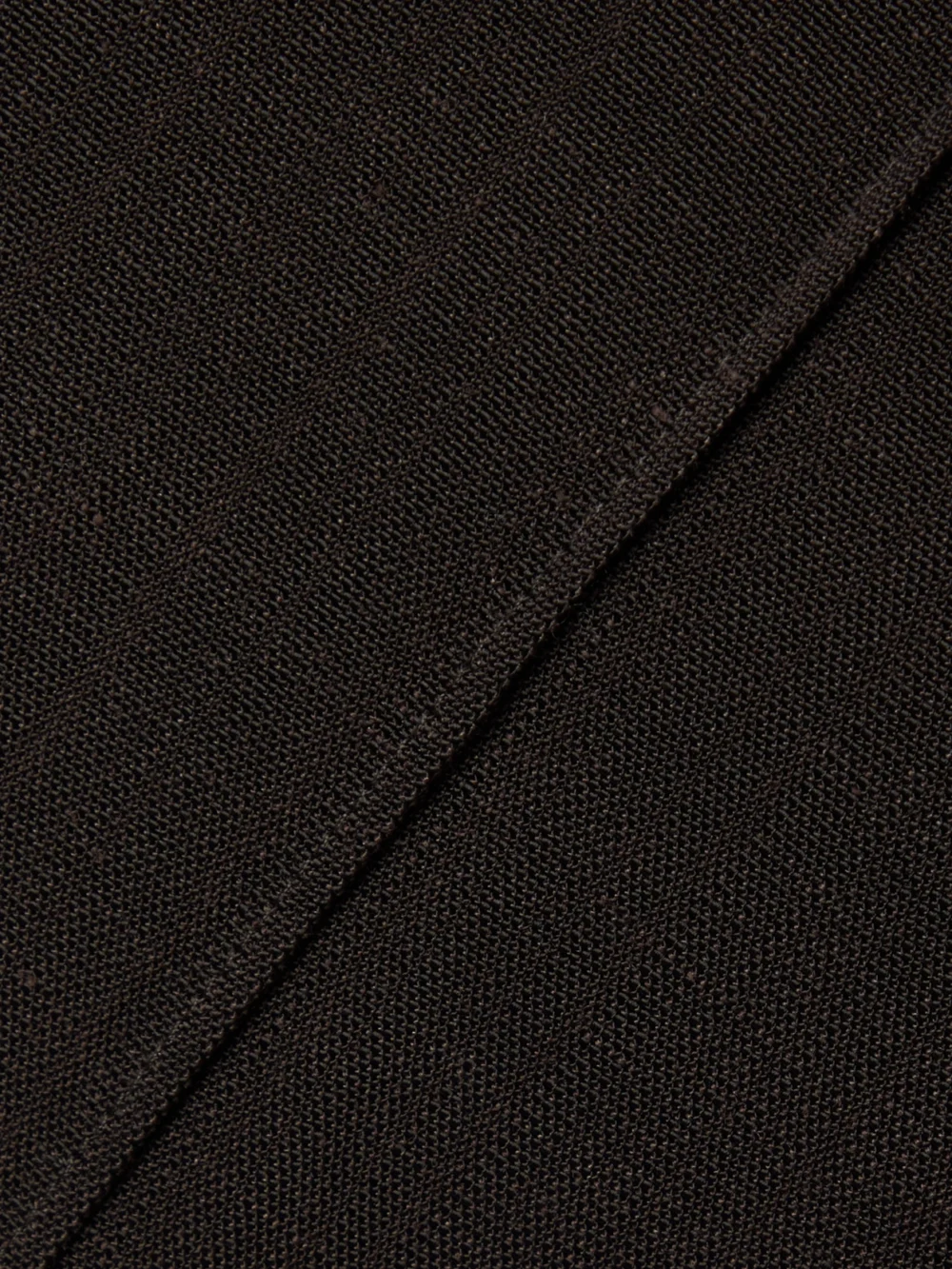 Close-up detail of the Co Woven Straight-leg Pants