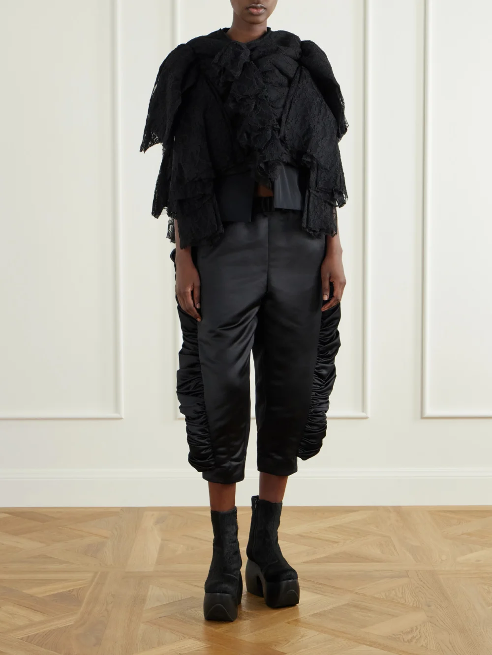 Comme des Garçons Cropped Ruffled Satin Slim-fit Capri Pants, worn by a model