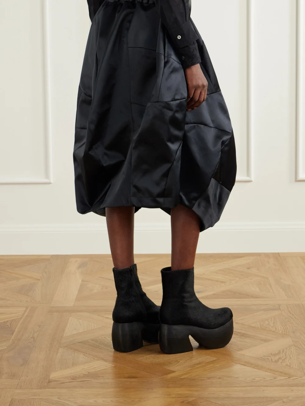 Back view of the Comme des Garçons Gathered Satin Midi Skirt