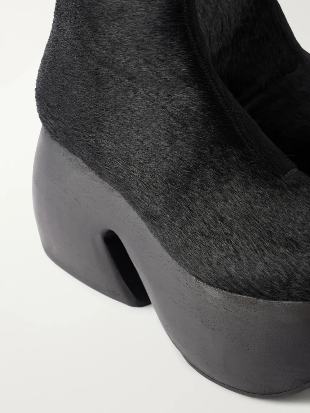 Close-up detail of the Comme des Garçons + John Fluevog Calf Hair Ankle Boots