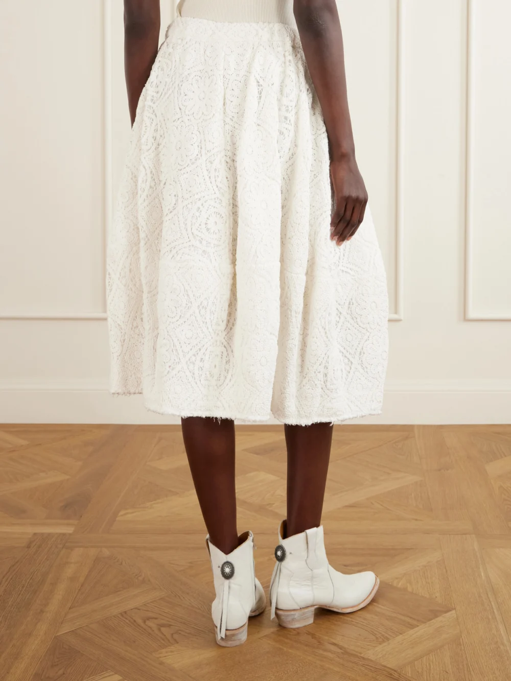 Back view of the Comme des Garçons Pleated Crocheted Cotton Midi Skirt