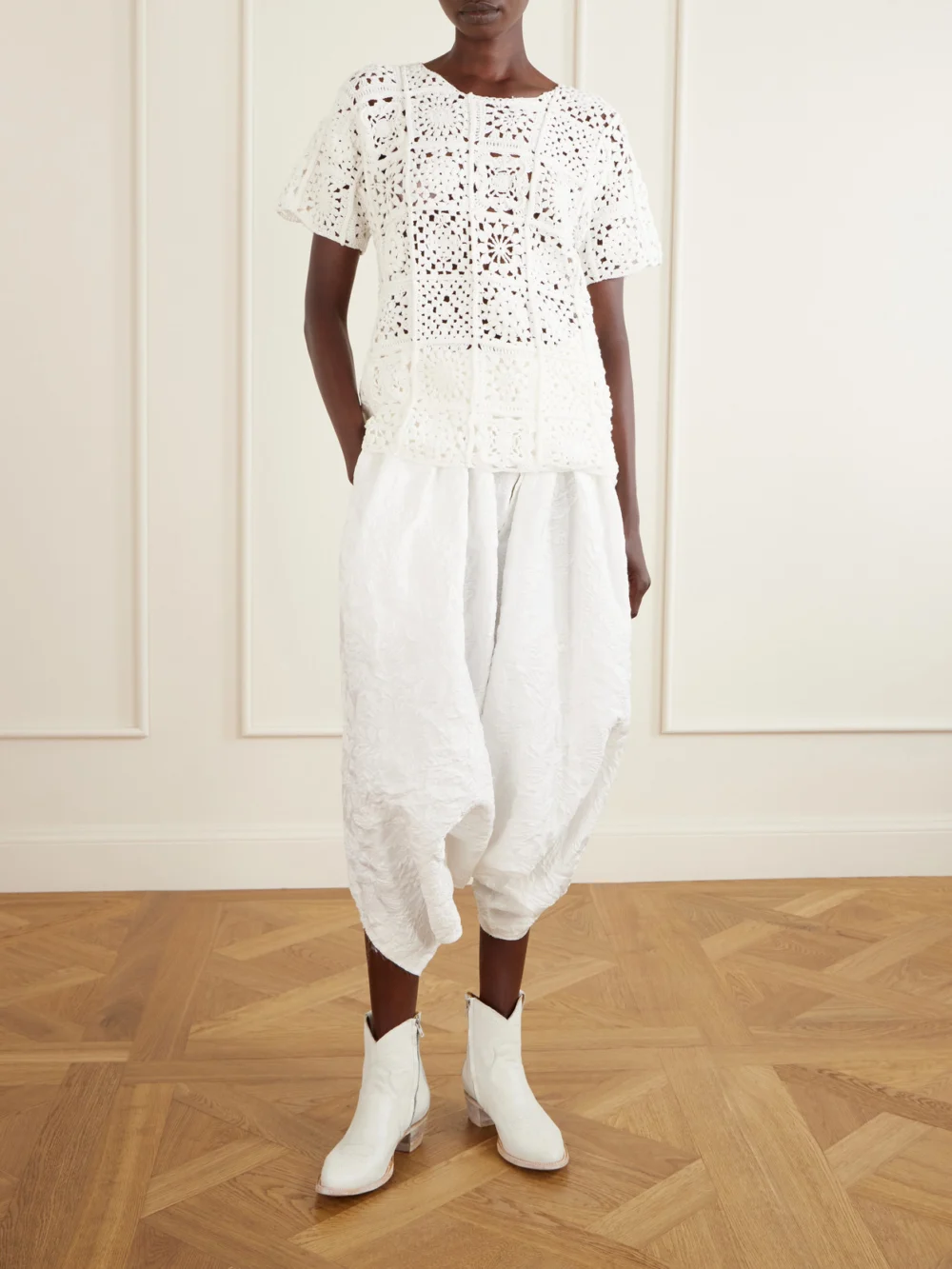 Comme des Garçons Pleated Jacquard-knit Wide-leg Pants, worn by a model