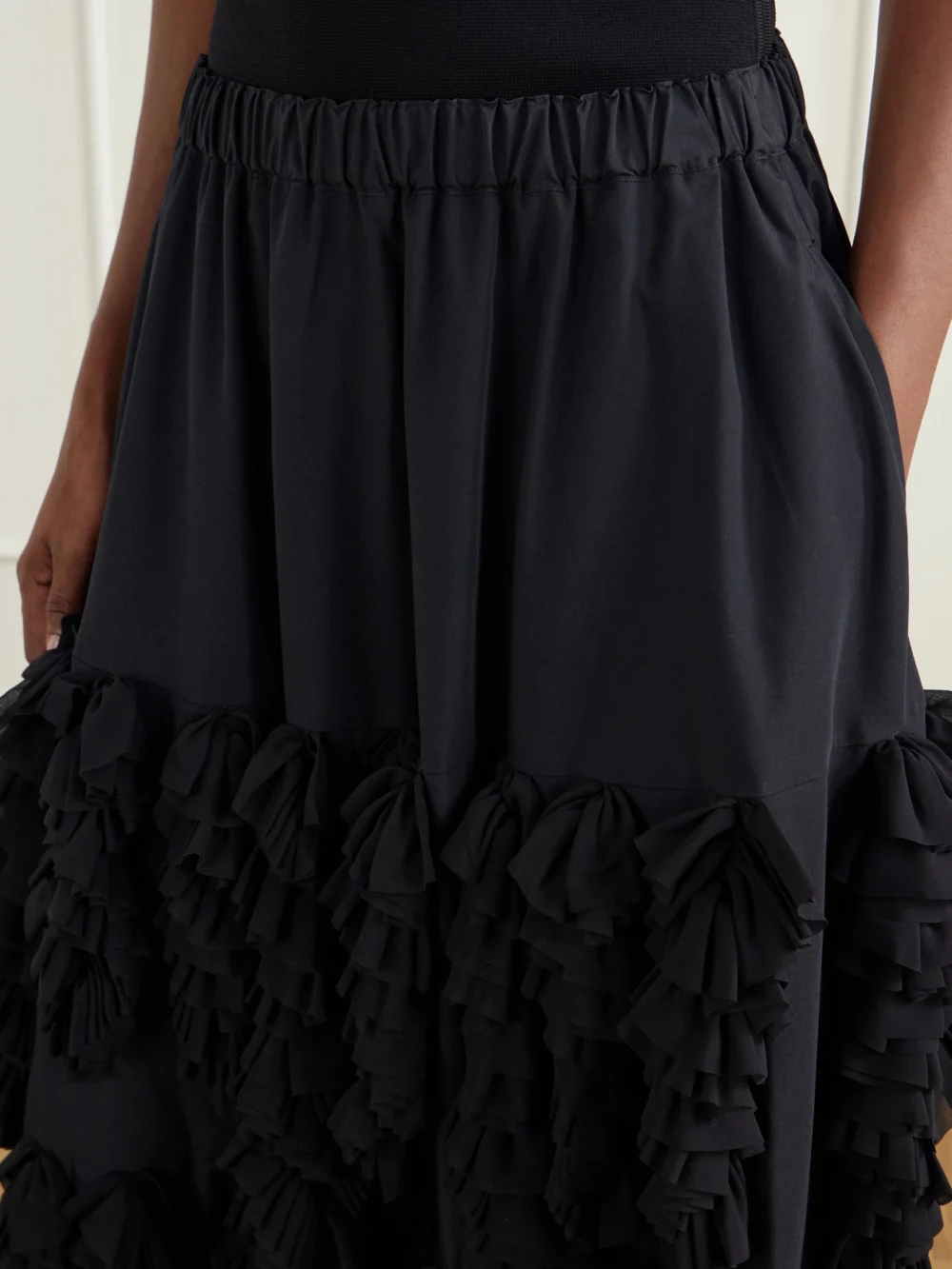 Close-up detail of the Comme des Garçons Tiered Ruffled Georgette Midi Skirt