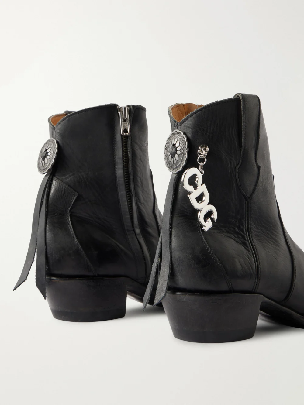 Close-up detail of the Comme des Garçons X Mexicana Embellished Leather Ankle Boots
