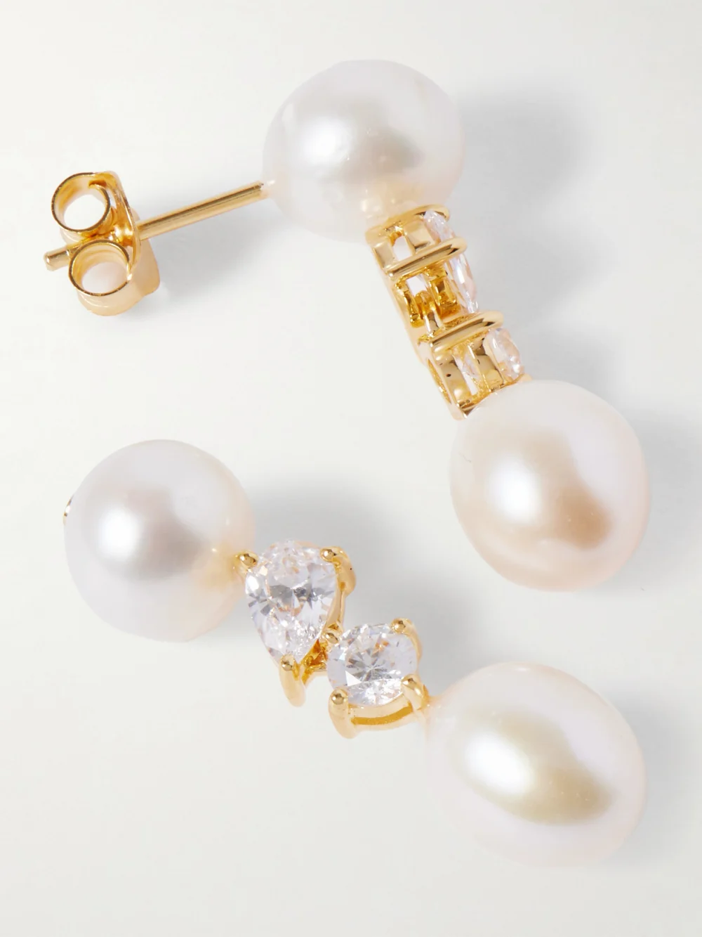 Close-up detail of the Completedworks Gold-plated, Pearl and Cubic Zirconia Earrings