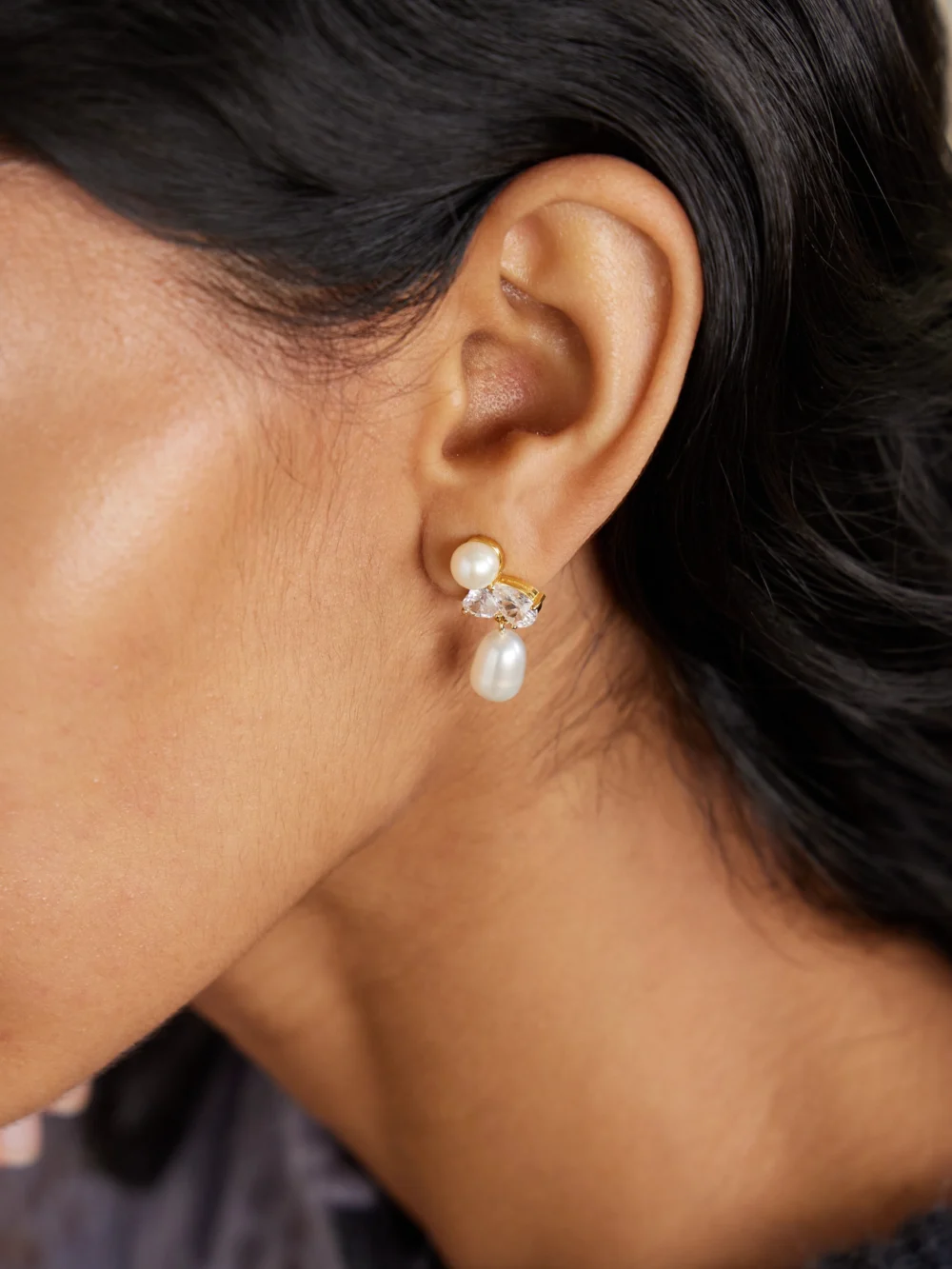Completedworks Infinity's Reversal Recycled Gold Vermeil, Cubic Zirconia and Pearl Earrings, styled view