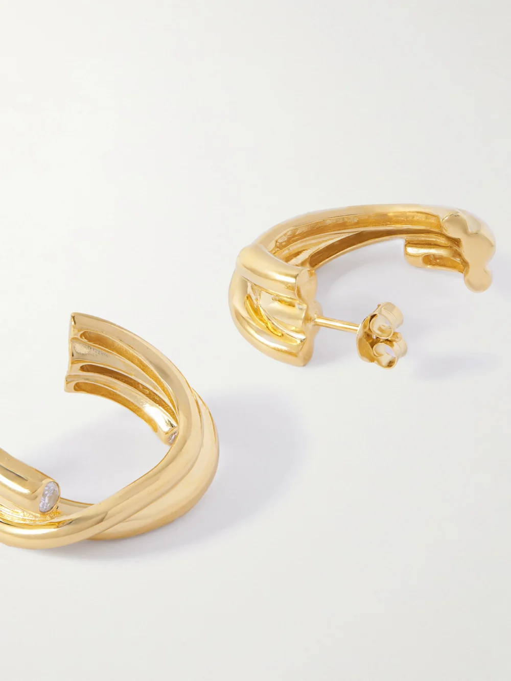 Close-up detail of the Completedworks Recycled Gold Vermeil Cubic Zirconia Earrings