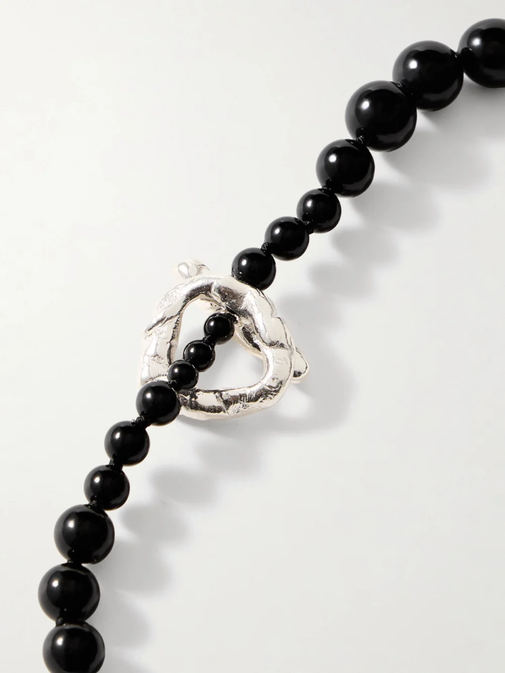 Back view of the Completedworks Recycled Silver, Onyx and Pearl Necklace