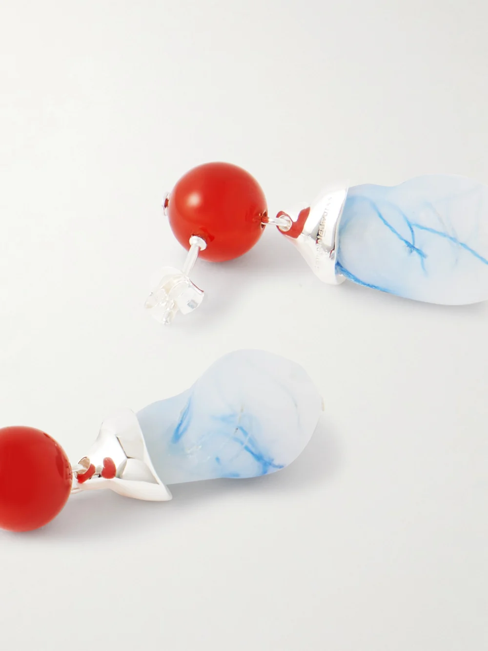Close-up detail of the Completedworks Recycled Silver, Resin and Agate Earrings