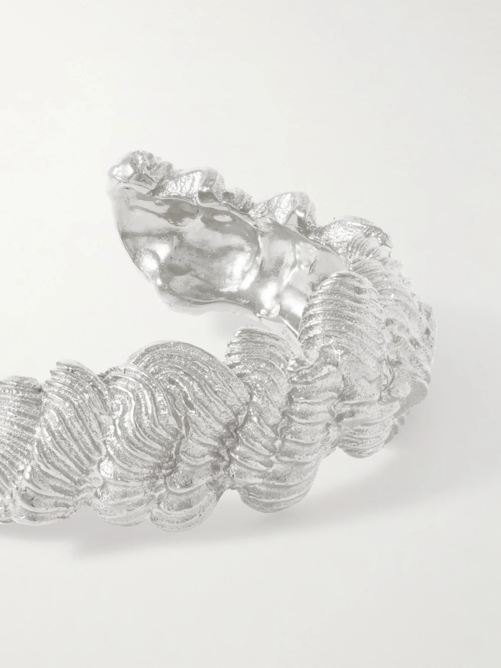 Close-up detail of the Completedworks Silver-plated Cuff