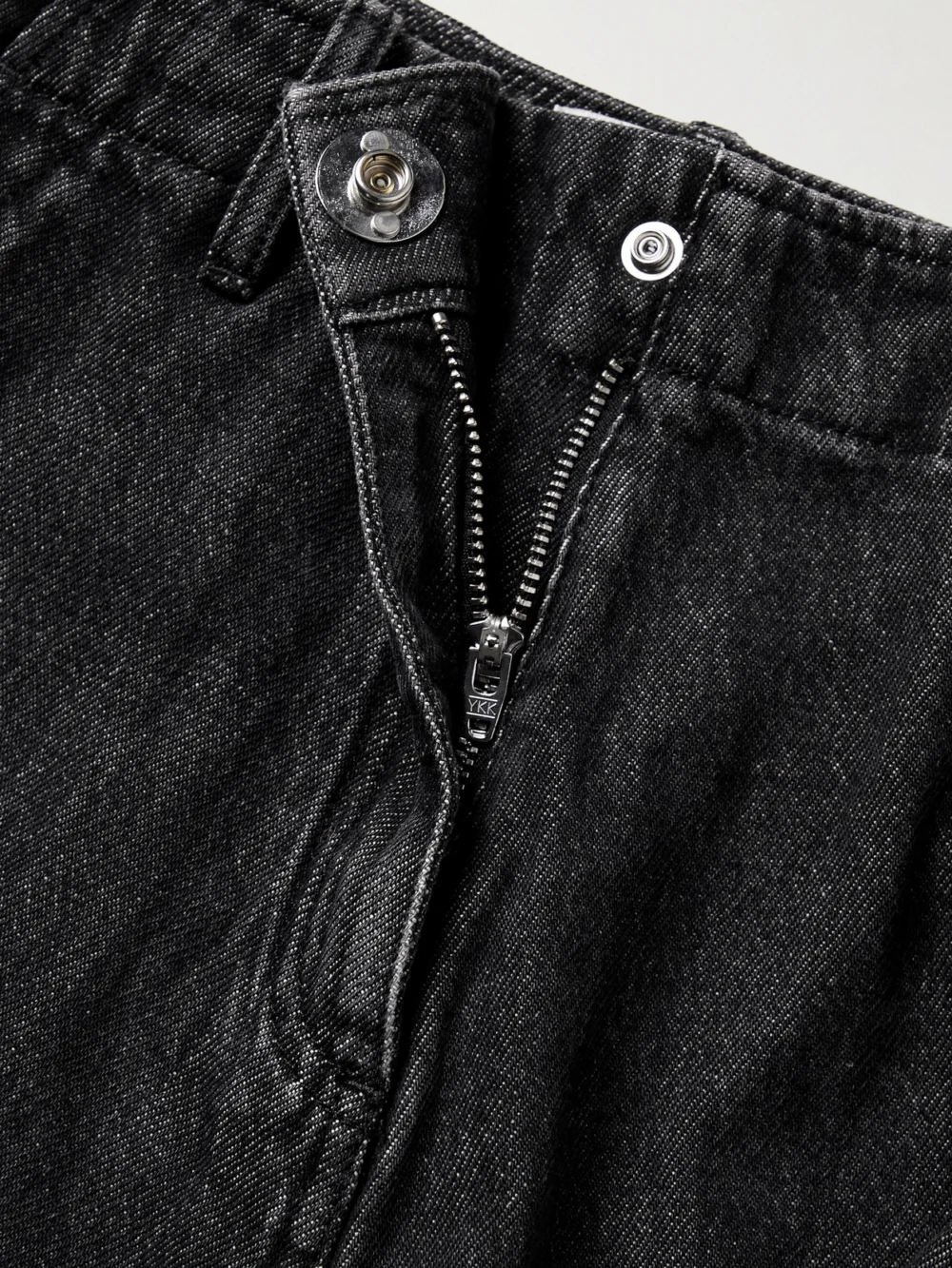 Close-up detail of the Coperni High-rise Wide-leg Cargo Jeans