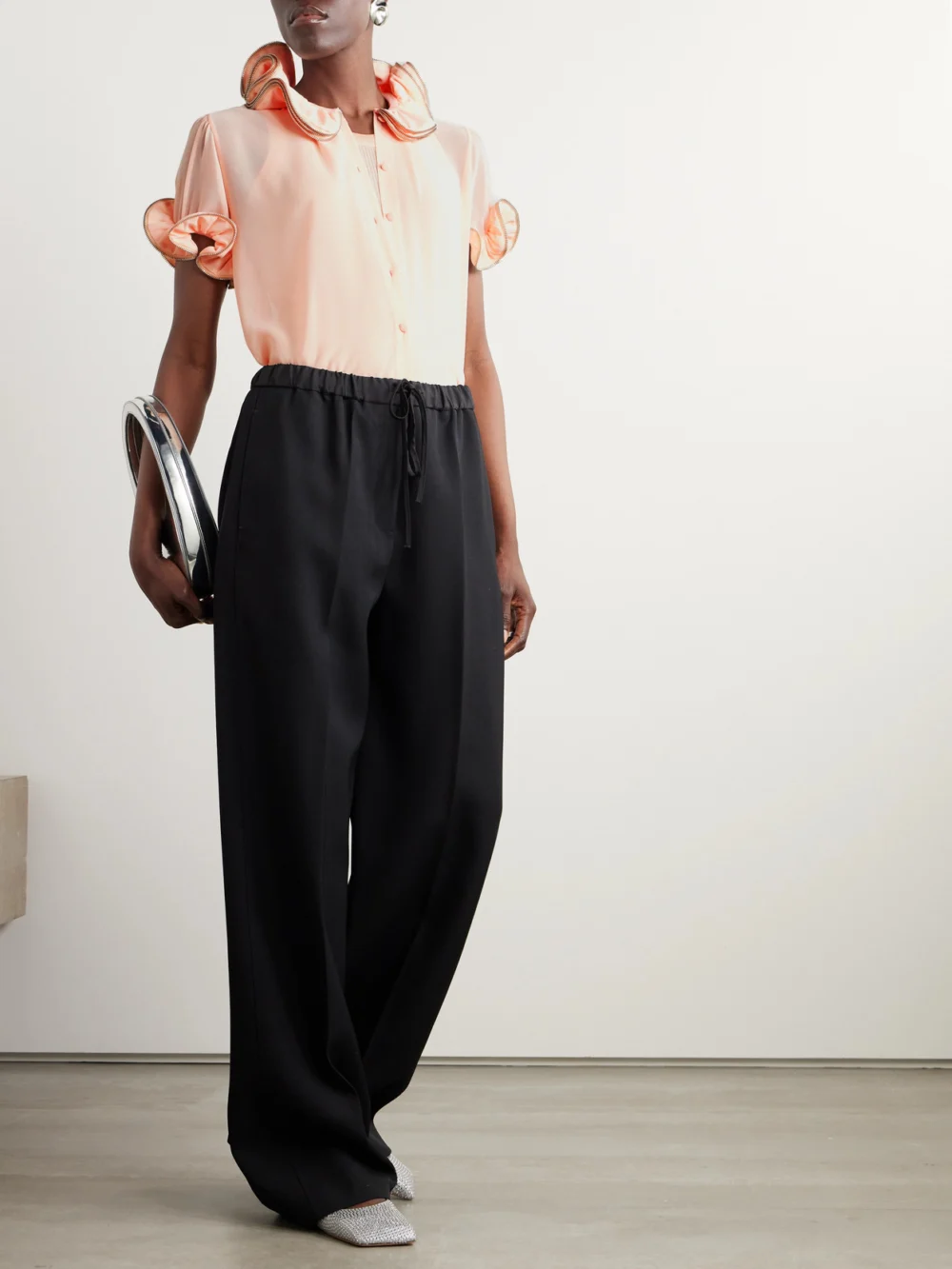 Coperni Zip-embellished Ruffled Chiffon Blouse, worn by a model