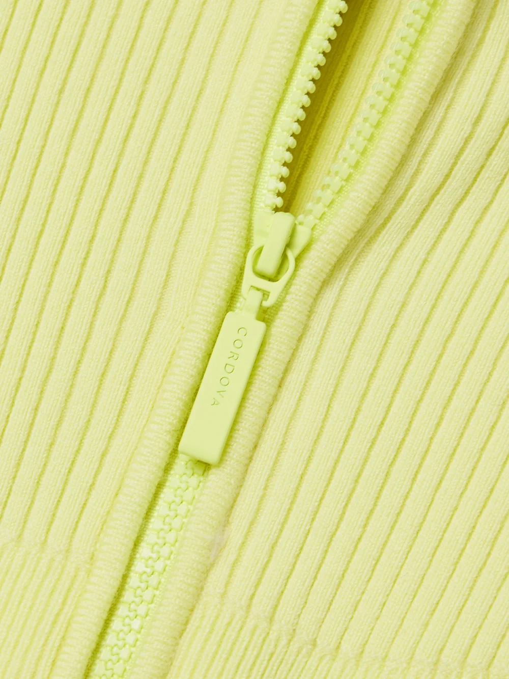 Close-up detail of the Cordova Butte Ribbed Merino Wool-blend Turtleneck Bodysuit
