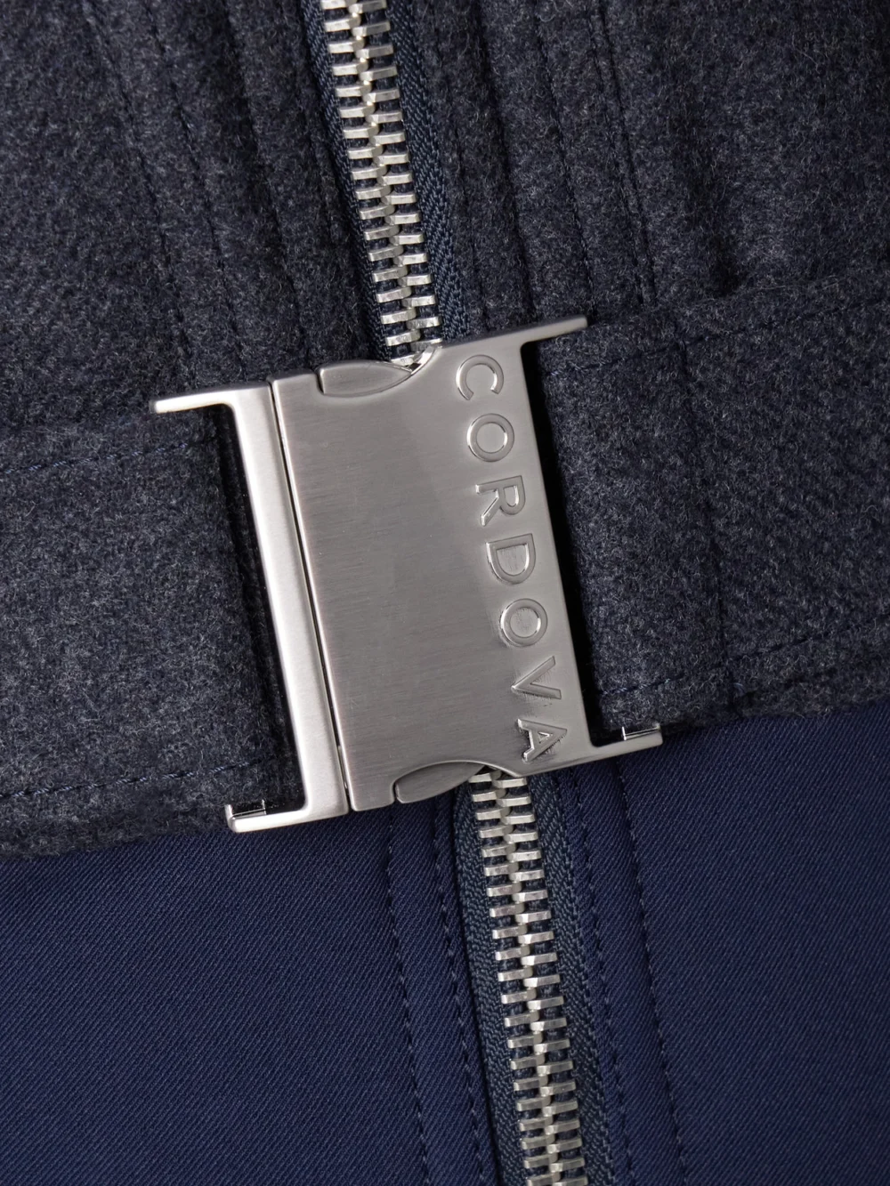 Close-up detail of the Cordova Eiger Belted Wool-blend and Twill Ski Suit