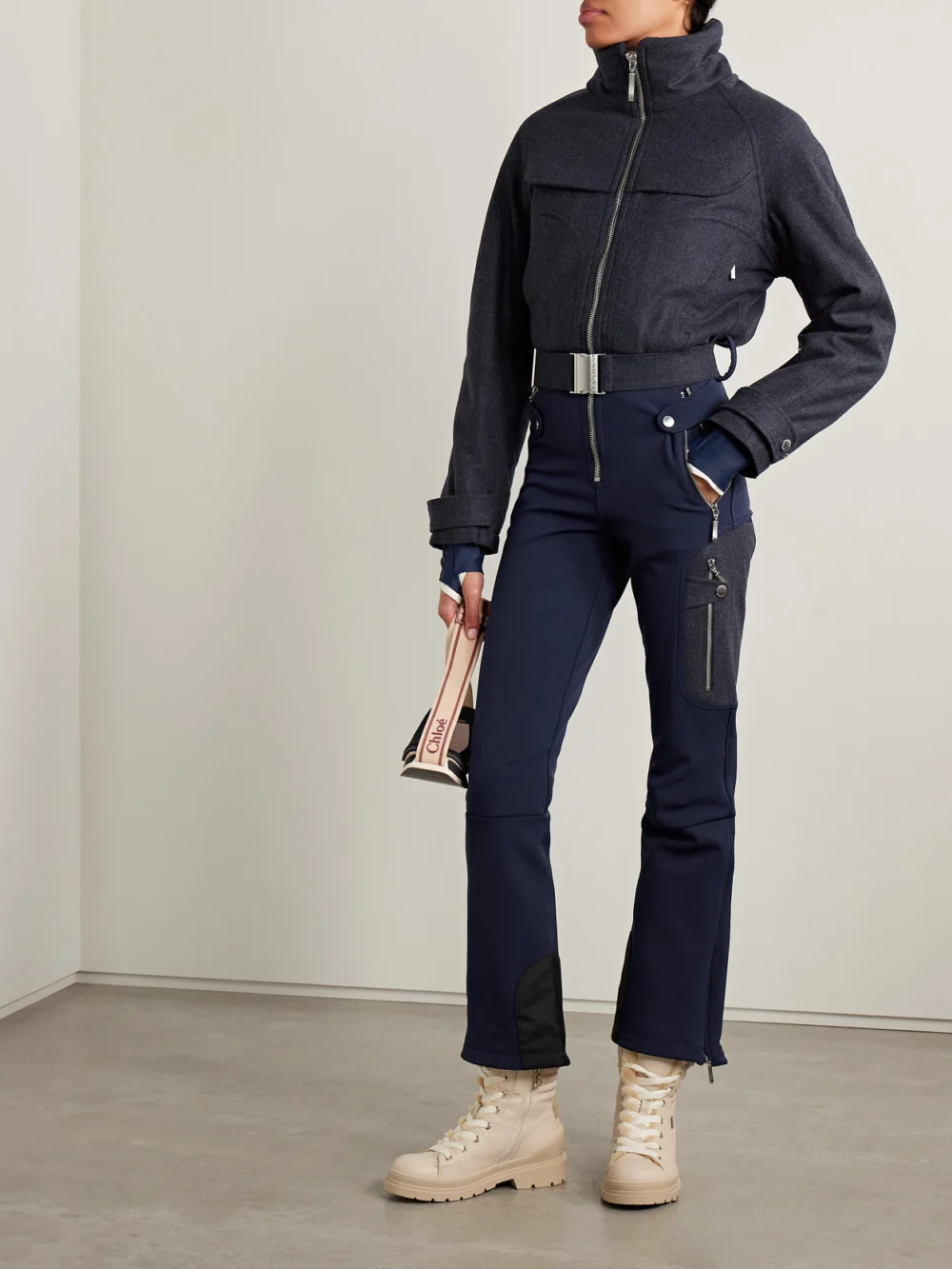 Cordova Eiger Belted Wool-blend and Twill Ski Suit, worn by a model