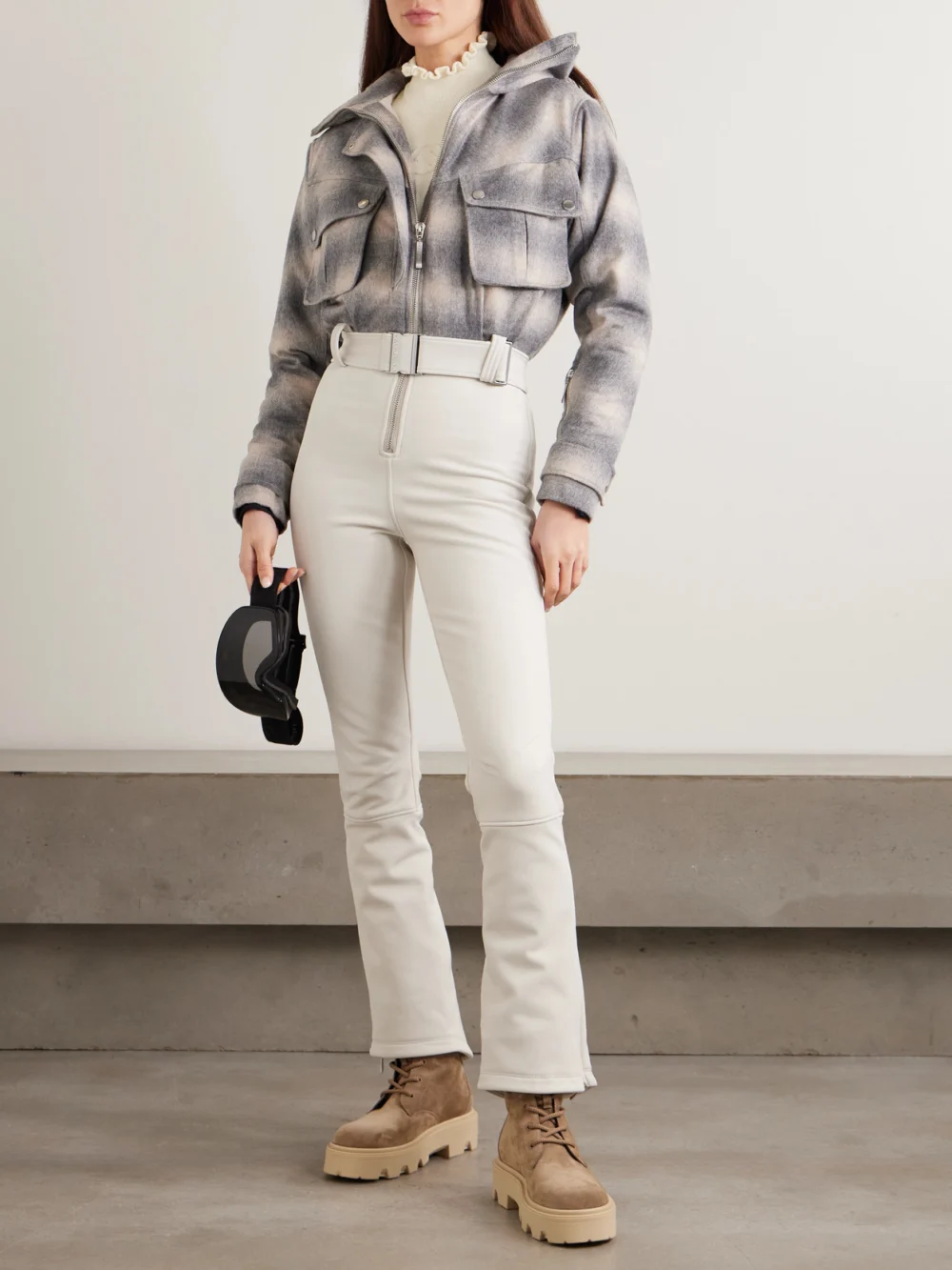 Cordova Kitz Ruffled Ribbed Merino Wool-blend Turtleneck Sweater, worn by a model