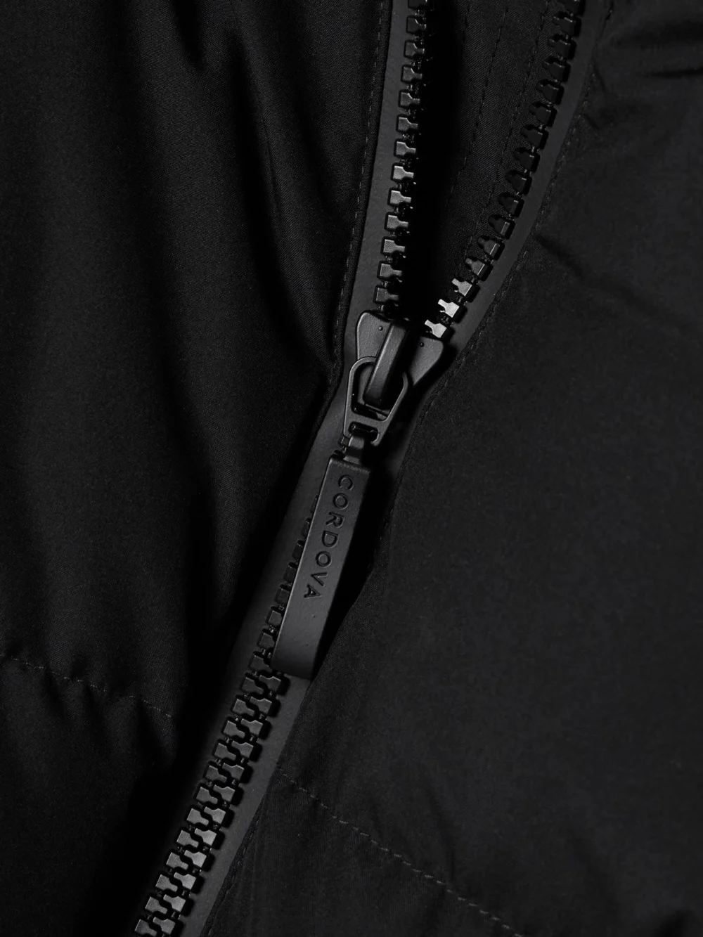 Close-up detail of the Cordova Meribel Hooded Quilted Recycled Down Ski Jacket