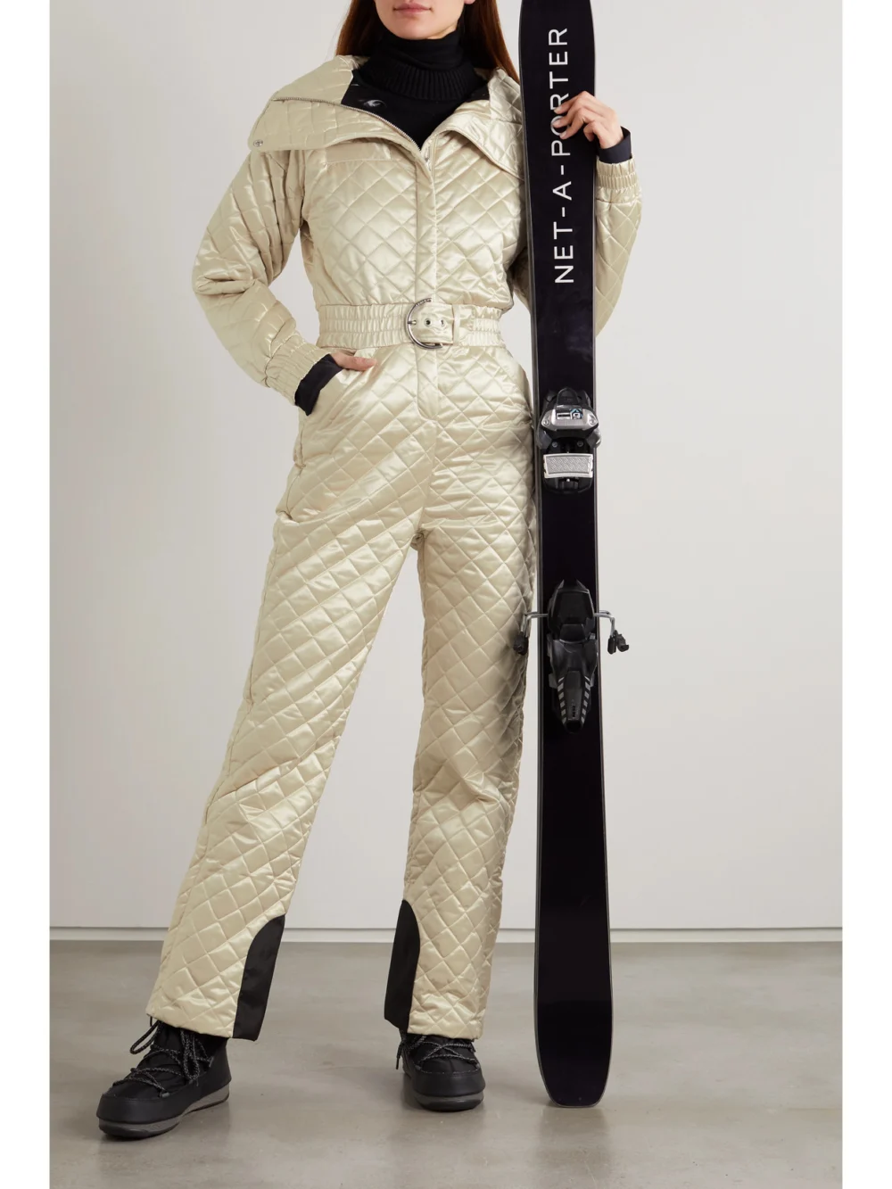 Cordova The Courmayeur Belted Quilted Ski Suit, worn by a model