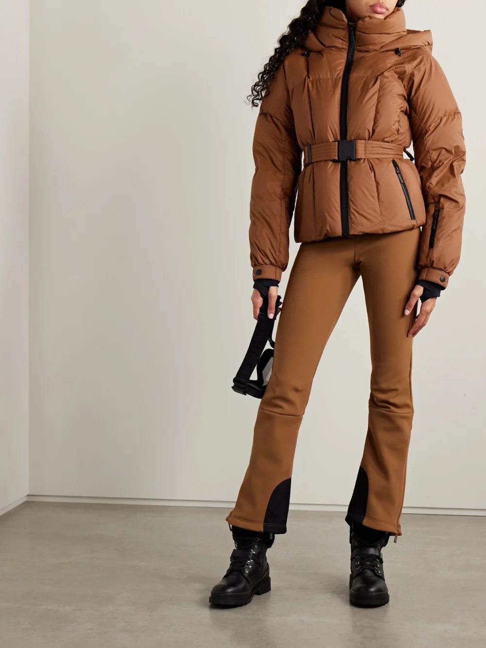 Cordova The Monterosa Hooded Belted Quilted Recycled Down Ski Jacket, worn by a model