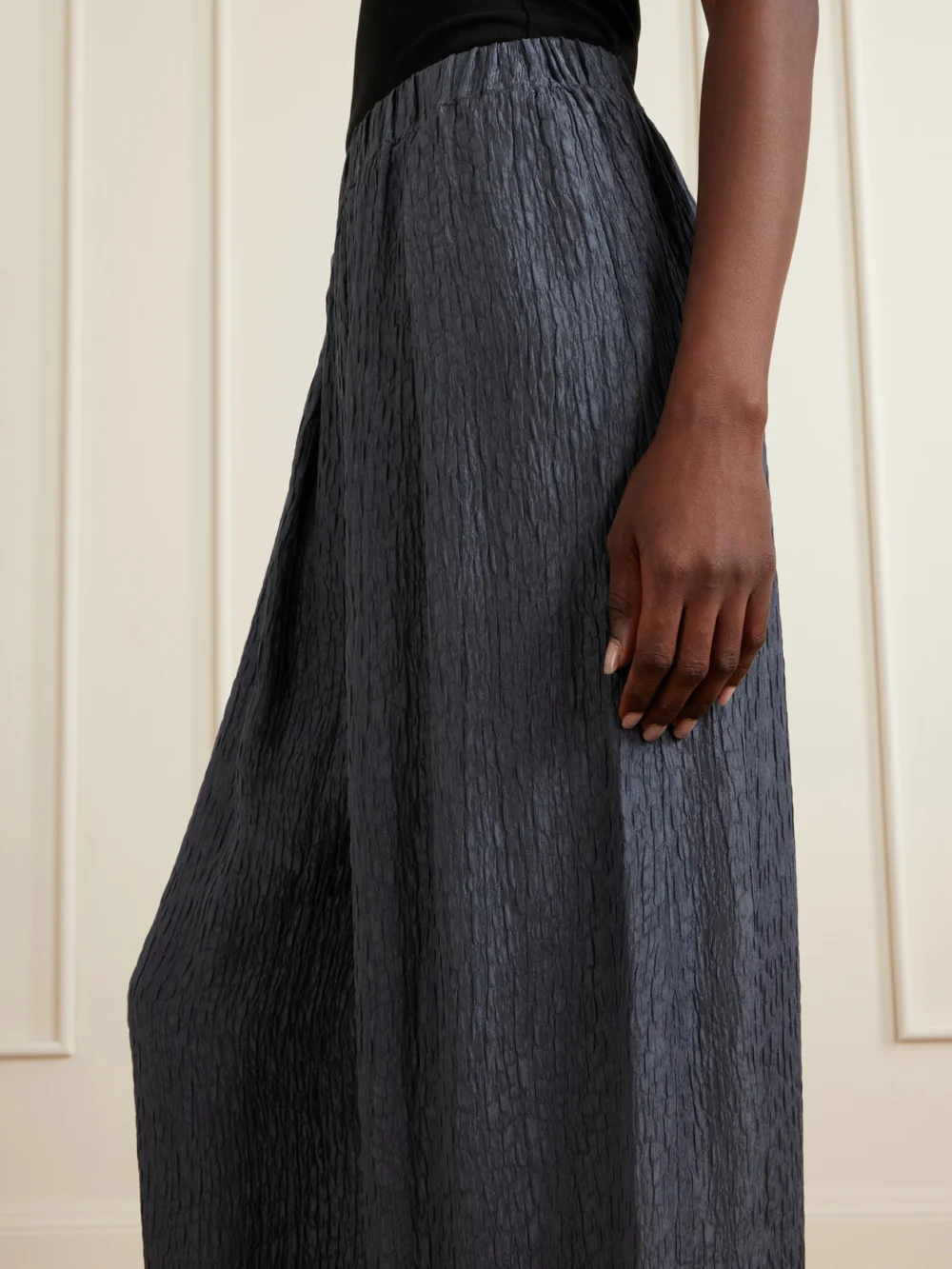 Close-up detail of the Cortana Anhelo Crinkled Silk-charmeuse Wide-leg Pants