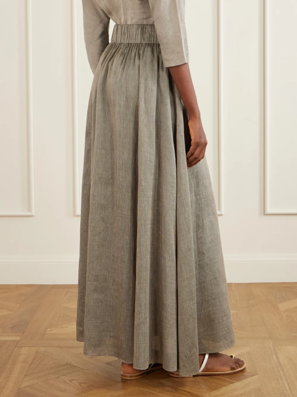 Back view of the Cortana Aria Striped Linen and Silk-blend Maxi Skirt