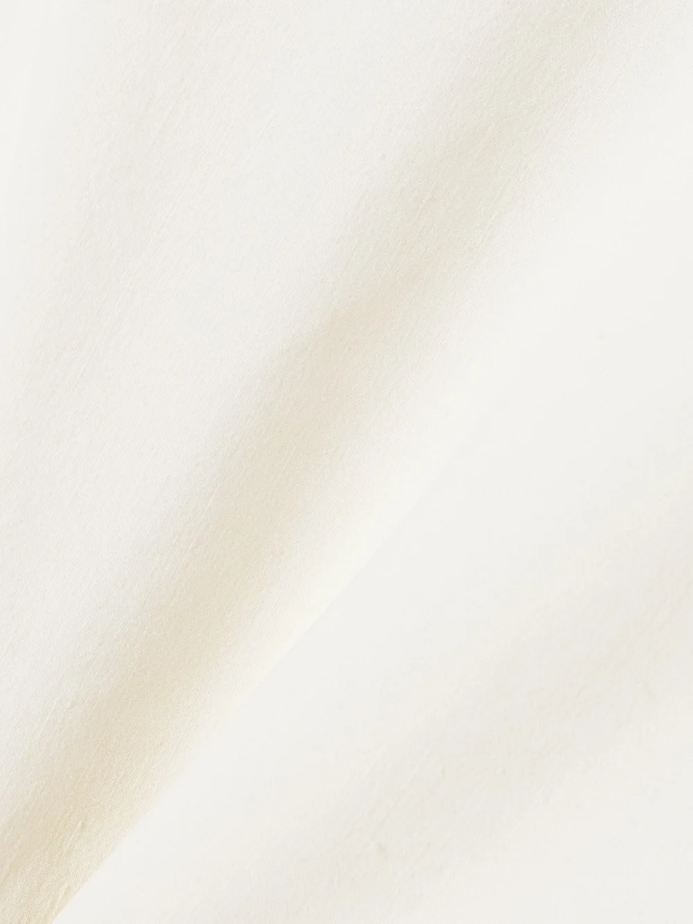 Close-up detail of the Cortana Asa Linen-blend Wrap Top
