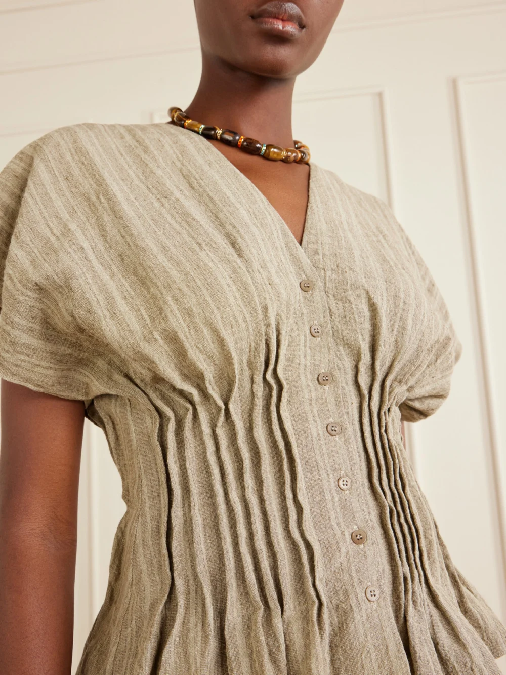 Close-up detail of the Cortana Camila Gathered Linen Top