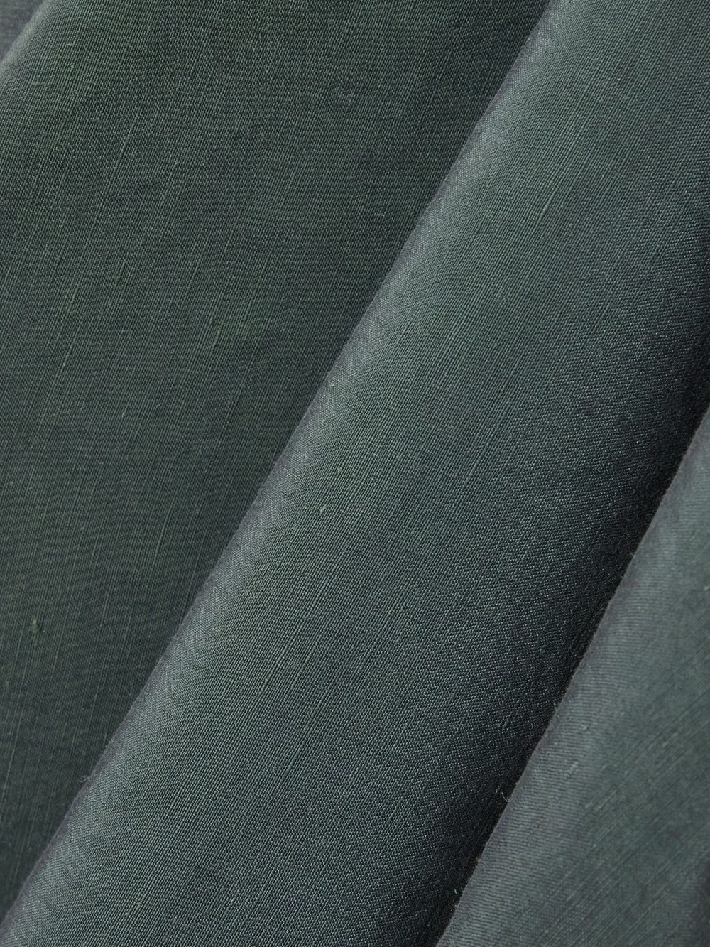 Close-up detail of the Cortana Mona Linen and Silk-blend Halterneck Maxi Wrap Dress