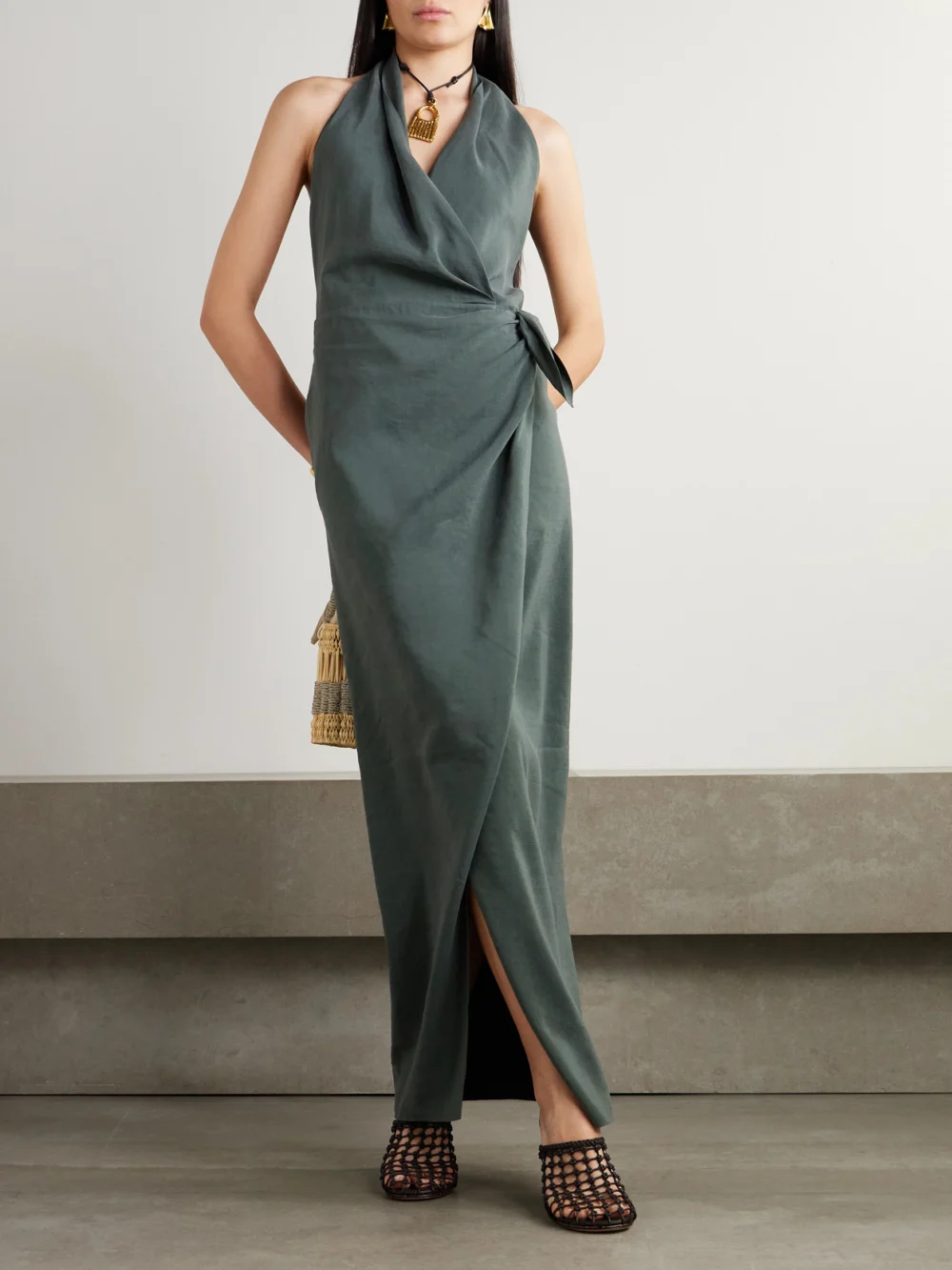 Cortana Mona Linen and Silk-blend Halterneck Maxi Wrap Dress, worn by a model