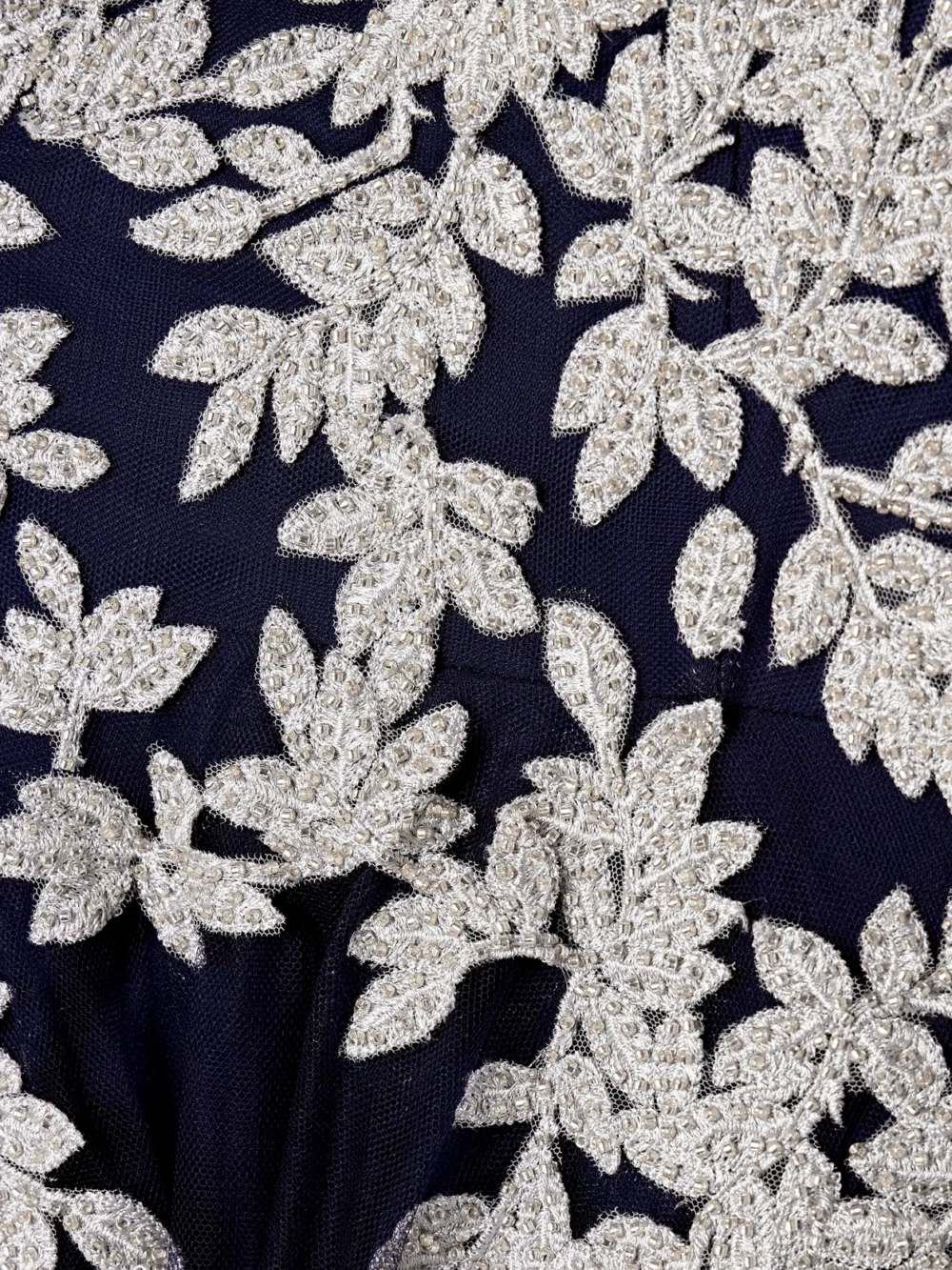 Close-up detail of the Costarellos Bead-embellished Embroidered Tulle Gown