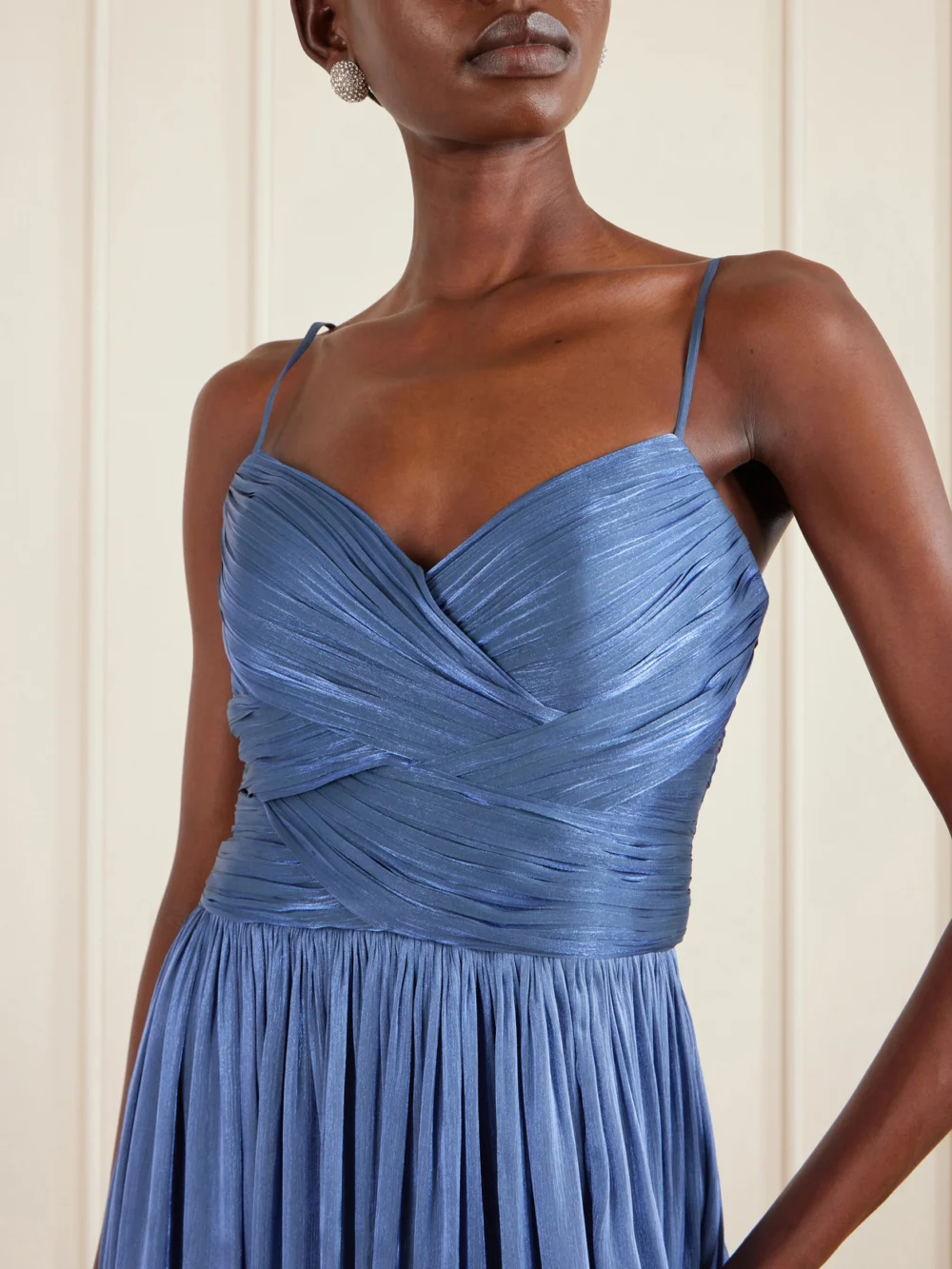Close-up detail of the Costarellos Sereen Draped Pleated Metallic Georgette Gown