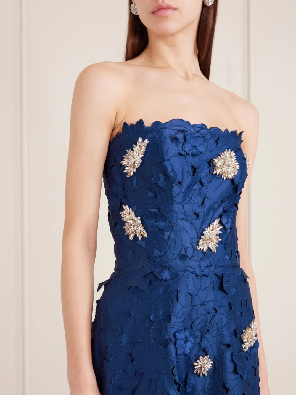 Close-up detail of the Costarellos Strapless Crystal-embellished Corded Lace Midi Dress