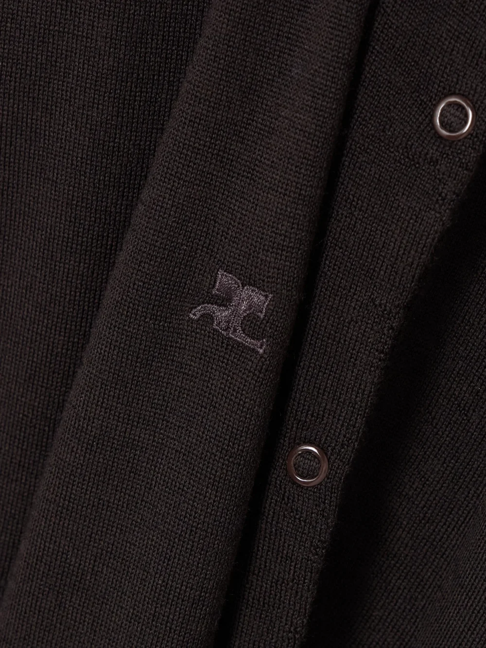 Close-up detail of the Courrèges Asymmetric Embroidered Merino Wool Midi Dress
