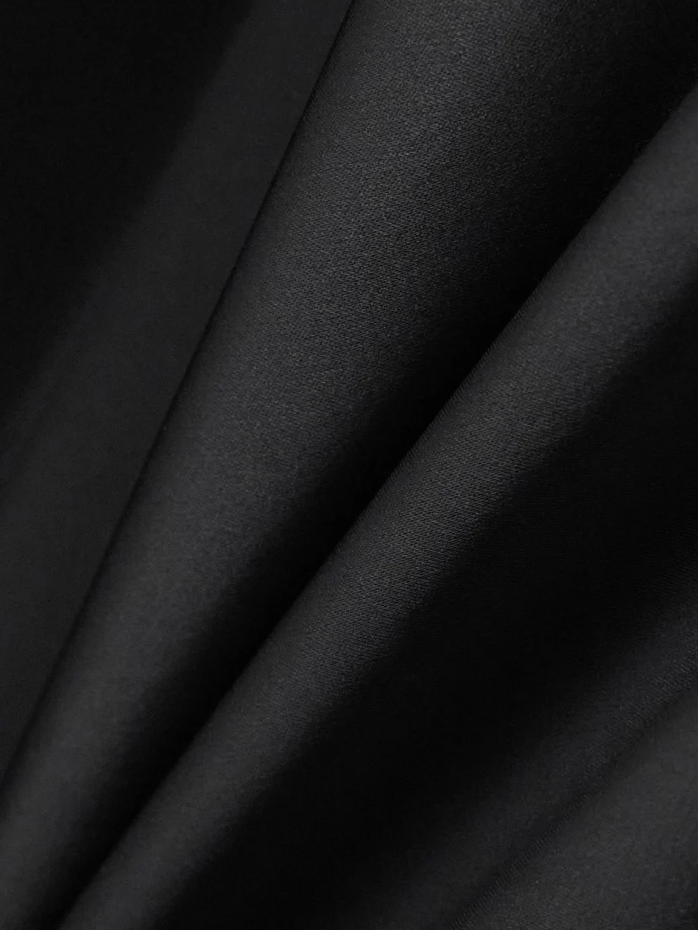 Close-up detail of the Courrèges Asymmetrical Lace-trimmed Satin Mini Dress