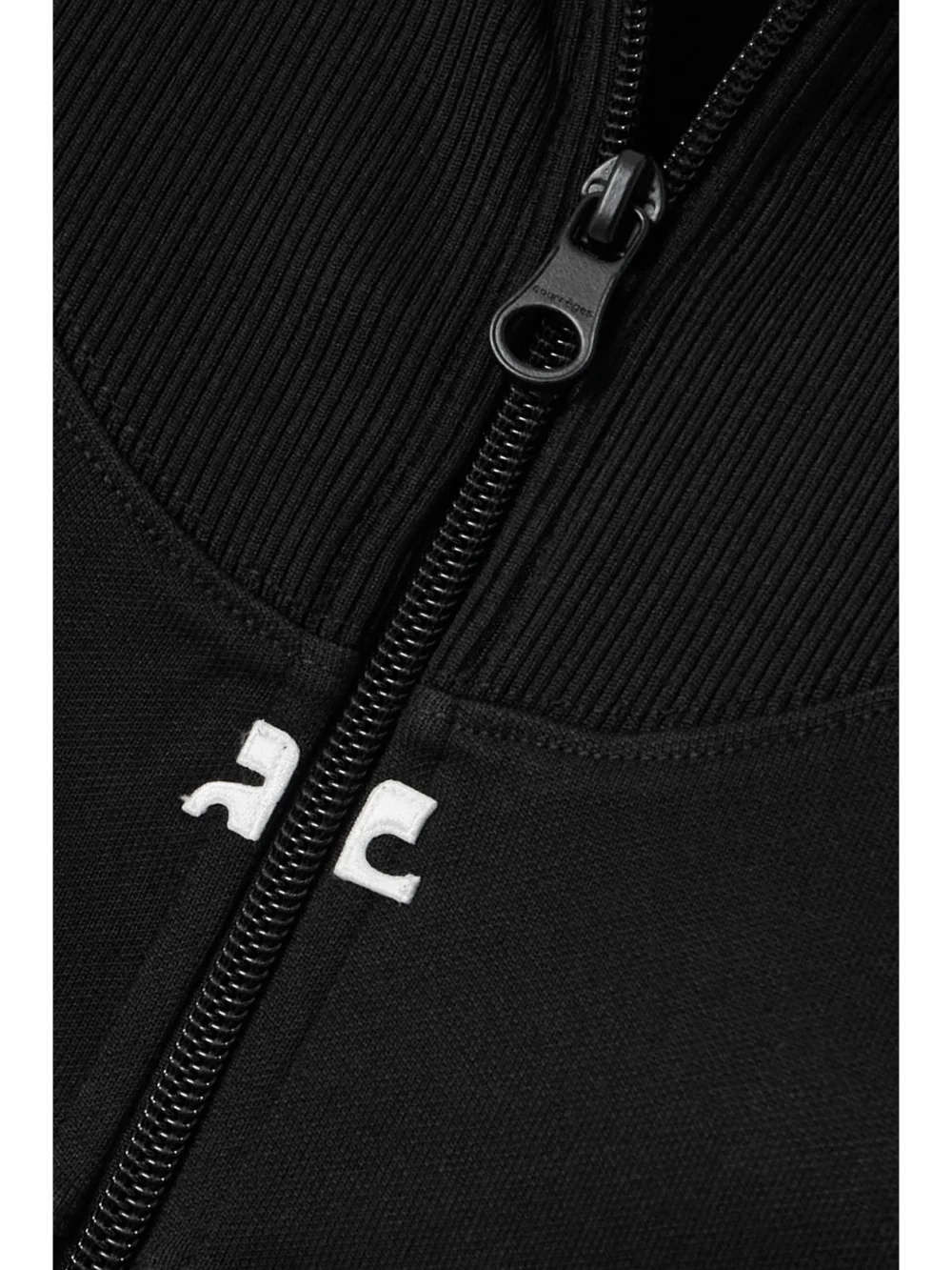 Close-up detail of the Courrèges Cropped Ribbed Jersey Jacket