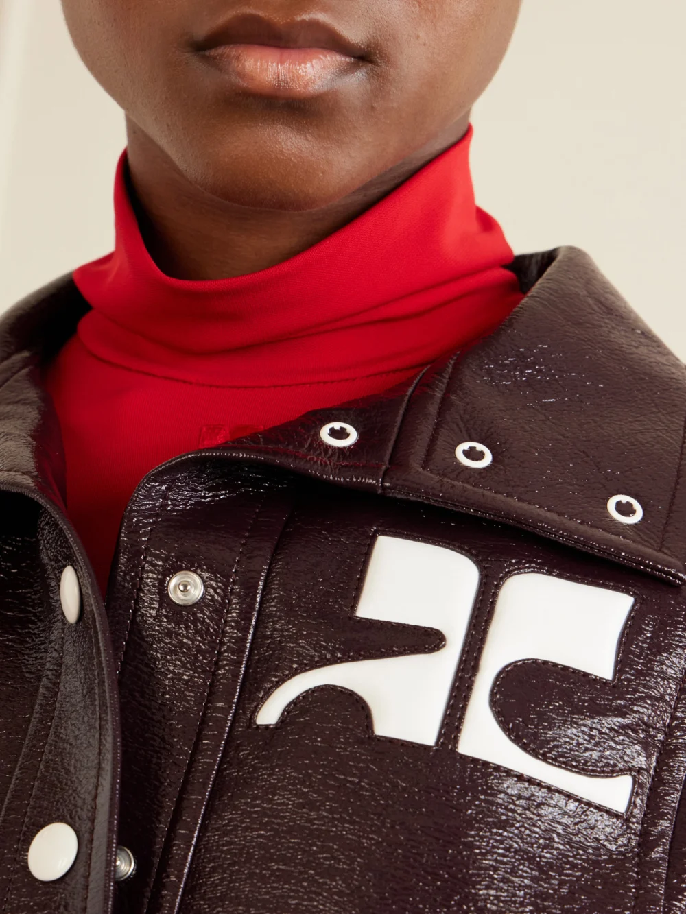 Close-up detail of the Courrèges Reedition Coated Cotton-blend Jacket